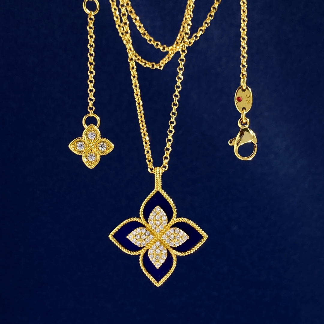 Collana Roberto Coin Princess Flower Oro giallo con accenti di diamanti varianti disponibili con madreperla bianca blu lapislazzuli verde malachite onice nero inserti turchesi varianti in oro bianco argentato con inserti in pietra abbinati e accenti di diamanti 18 pollici