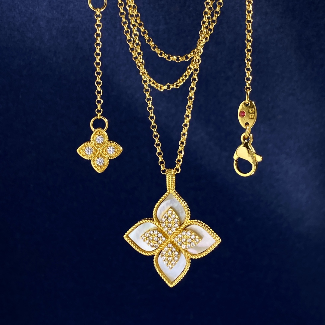Collana Roberto Coin Princess Flower Oro giallo con accenti di diamanti varianti disponibili con madreperla bianca blu lapislazzuli verde malachite onice nero inserti turchesi varianti in oro bianco argentato con inserti in pietra abbinati e accenti di diamanti 18 pollici