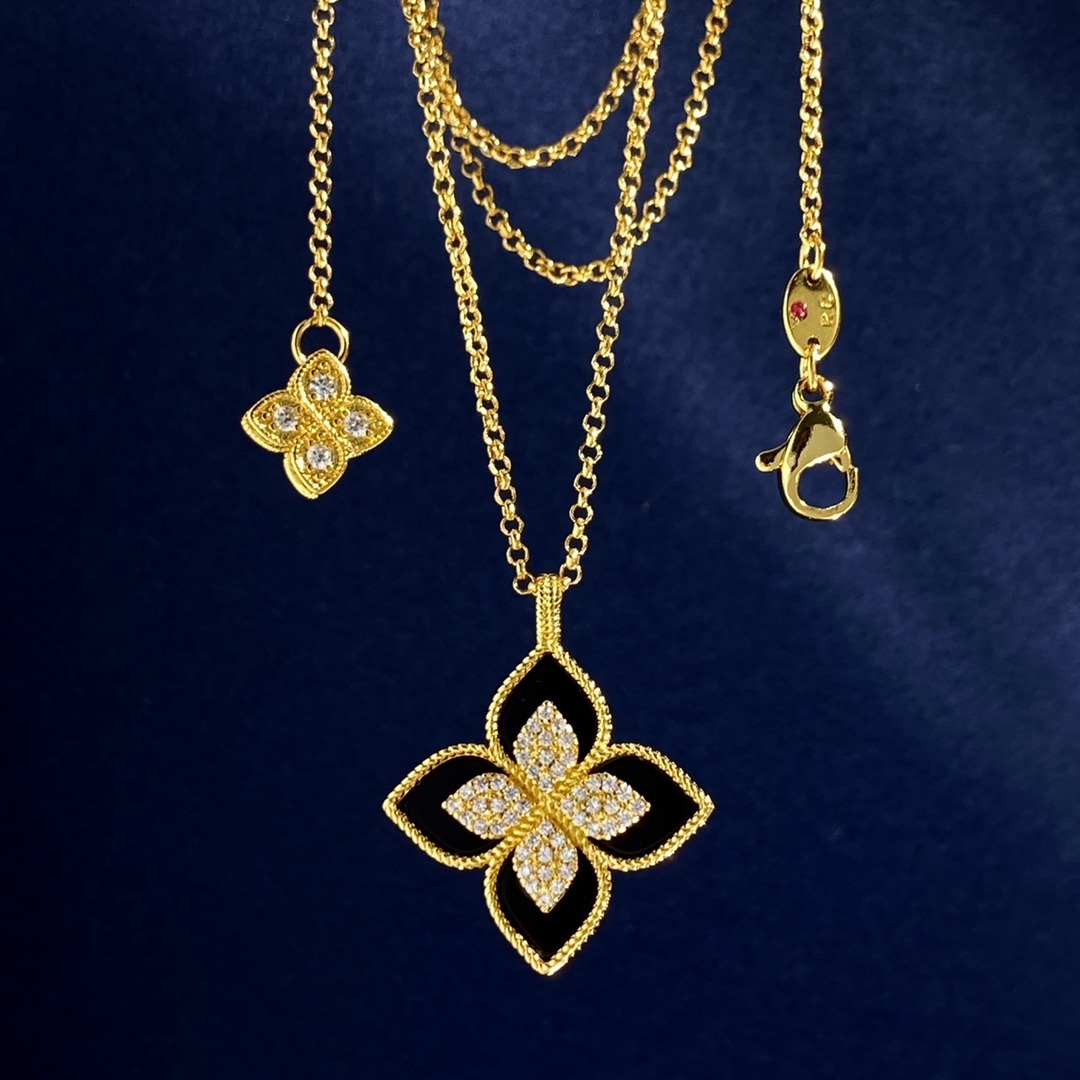 Collana Roberto Coin Princess Flower Oro giallo con accenti di diamanti varianti disponibili con madreperla bianca blu lapislazzuli verde malachite onice nero inserti turchesi varianti in oro bianco argentato con inserti in pietra abbinati e accenti di diamanti 18 pollici