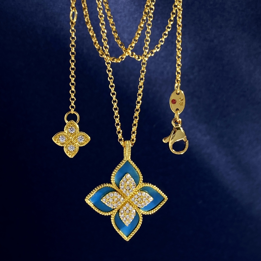 Collana Roberto Coin Princess Flower Oro giallo con accenti di diamanti varianti disponibili con madreperla bianca blu lapislazzuli verde malachite onice nero inserti turchesi varianti in oro bianco argentato con inserti in pietra abbinati e accenti di diamanti 18 pollici
