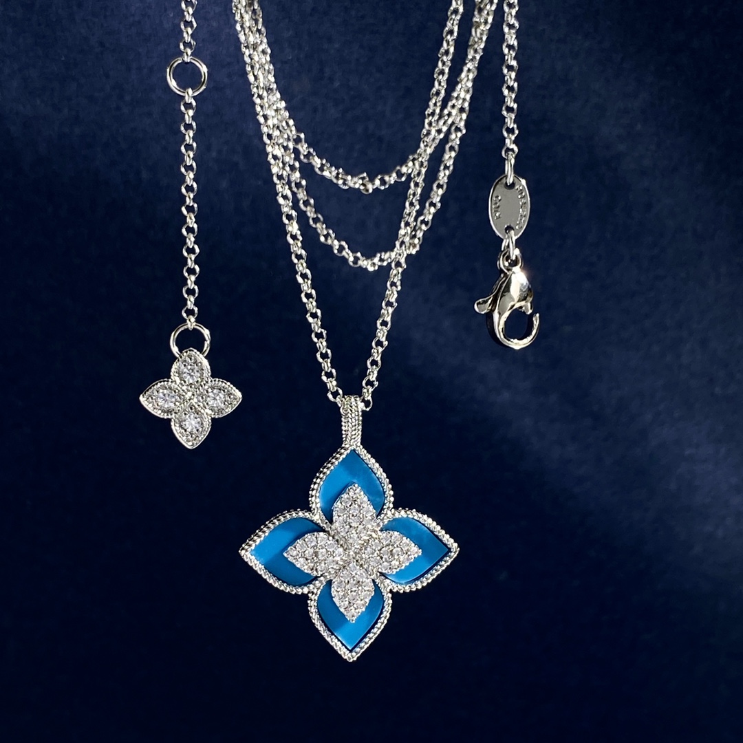 Collana Roberto Coin Princess Flower Metallo in argento sterling con pavé di diamanti trasparenti disponibile in onice nero blu turchese e intarsi in pietra madreperla bianca Catena regolabile da 18 pollici