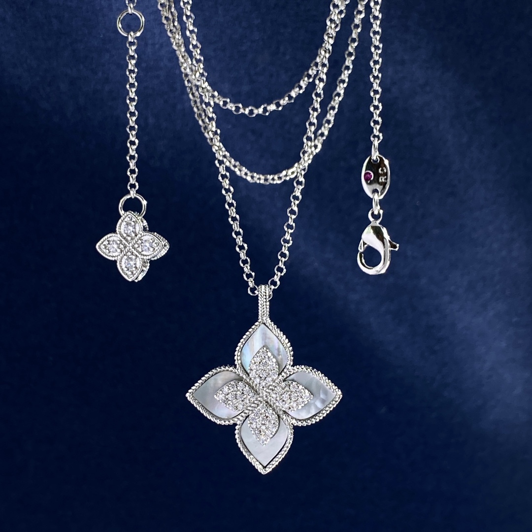 Collana Roberto Coin Princess Flower Metallo in argento sterling con pavé di diamanti trasparenti disponibile in onice nero blu turchese e intarsi in pietra madreperla bianca Catena regolabile da 18 pollici