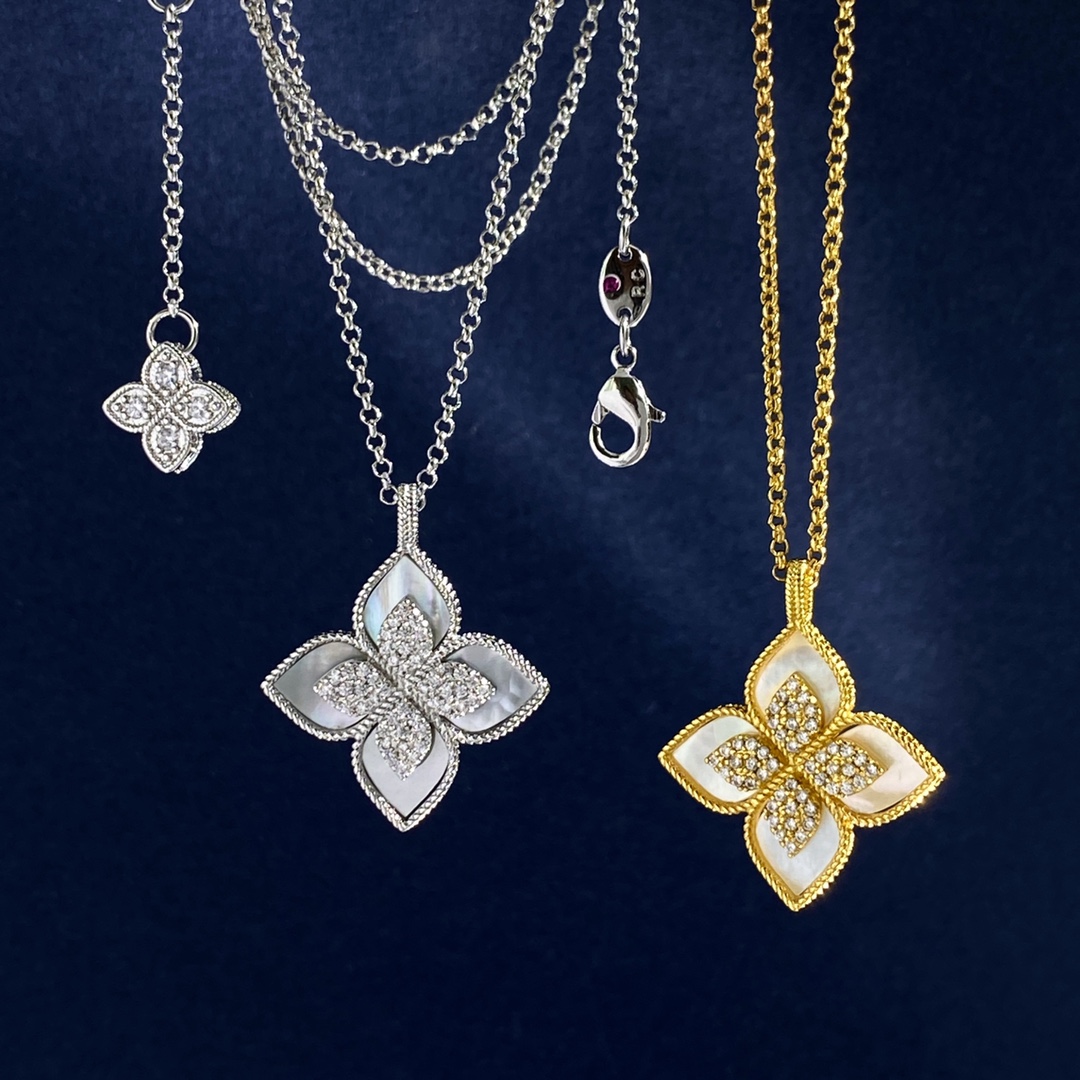 Collana Roberto Coin Princess Flower Metallo in argento sterling con pavé di diamanti trasparenti disponibile in onice nero blu turchese e intarsi in pietra madreperla bianca Catena regolabile da 18 pollici