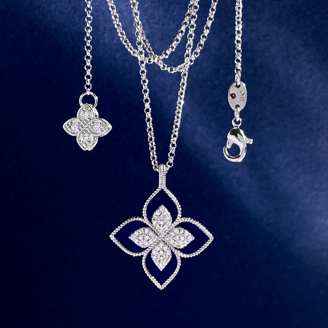 Collana Roberto Coin Princess Flower Metallo in argento sterling con pavé di diamanti trasparenti disponibile in onice nero blu turchese e intarsi in pietra madreperla bianca Catena regolabile da 18 pollici