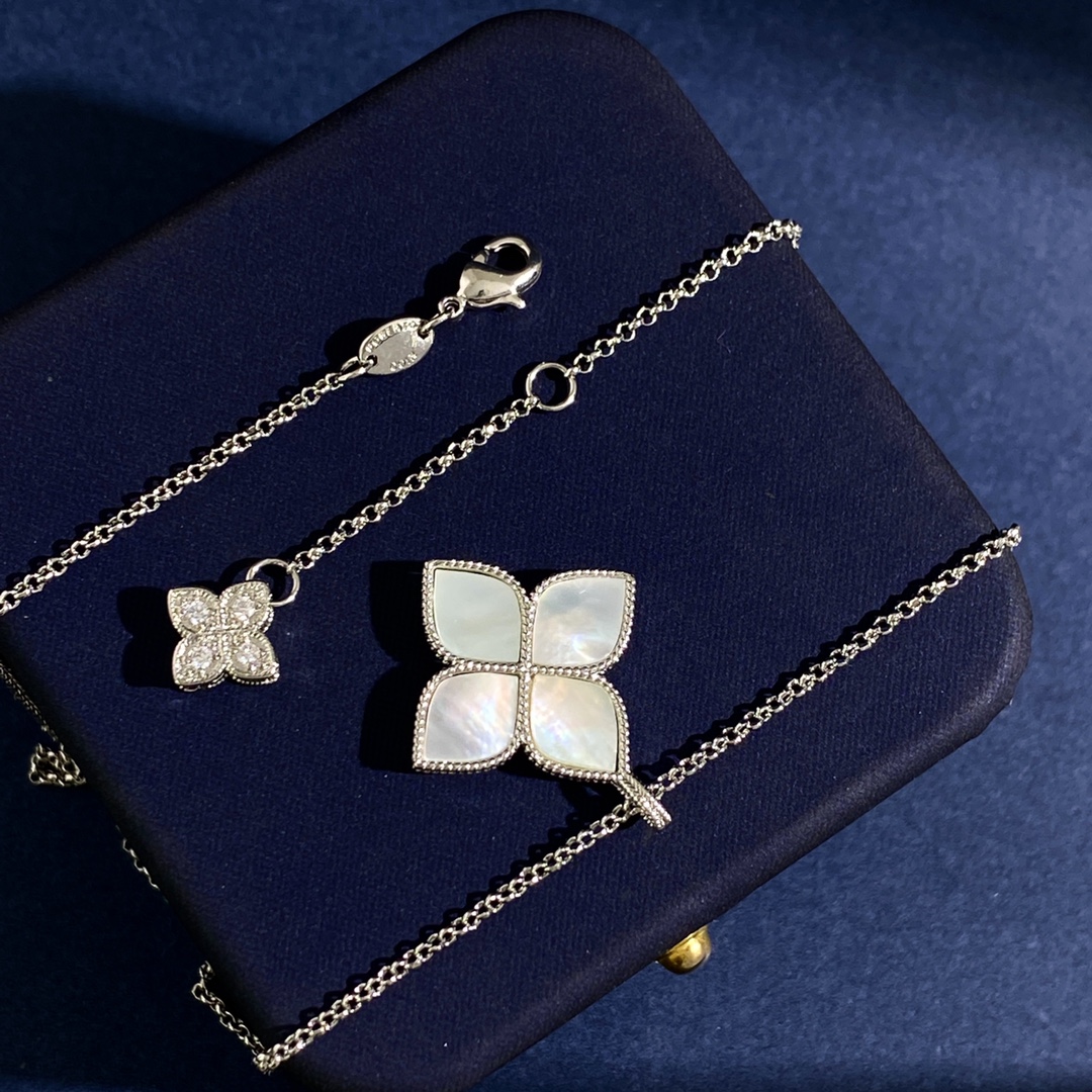 Collana Roberto Coin Princess Flower Metallo in argento sterling con pavé di diamanti trasparenti disponibile in onice nero blu turchese e intarsi in pietra madreperla bianca Catena regolabile da 18 pollici