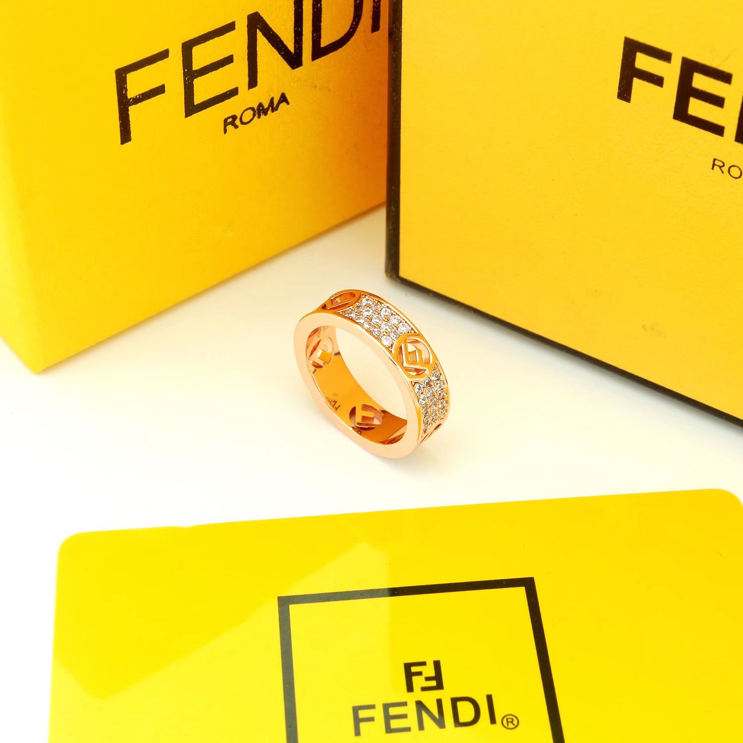 Fendi F IS FENDI ring Gold-tone metal with clear crystals rose gold-tone metal with clear crystals silver-tone metal with clear crystals 6 7 8 9