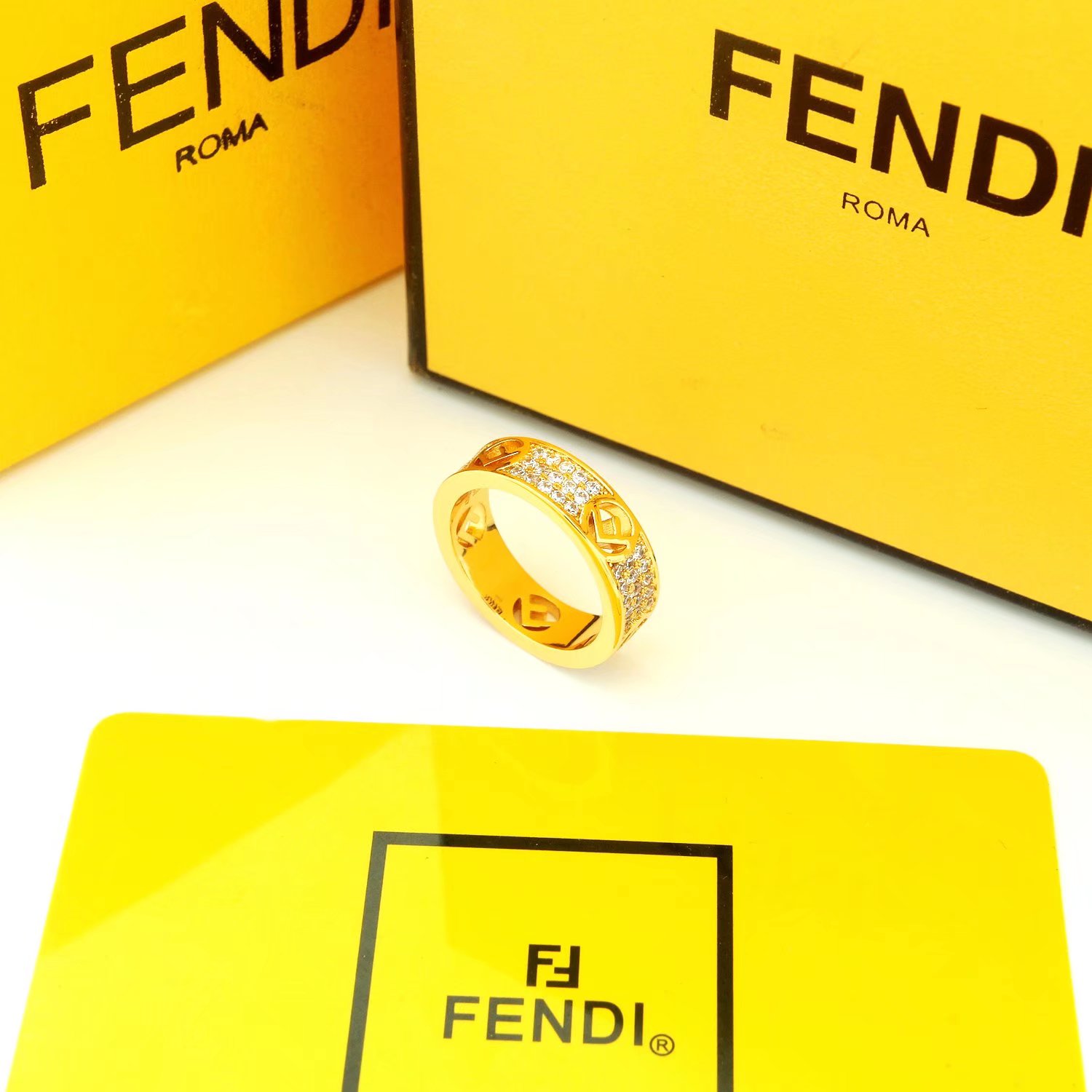 Fendi F IS FENDI ring Gold-tone metal with clear crystals rose gold-tone metal with clear crystals silver-tone metal with clear crystals 6 7 8 9
