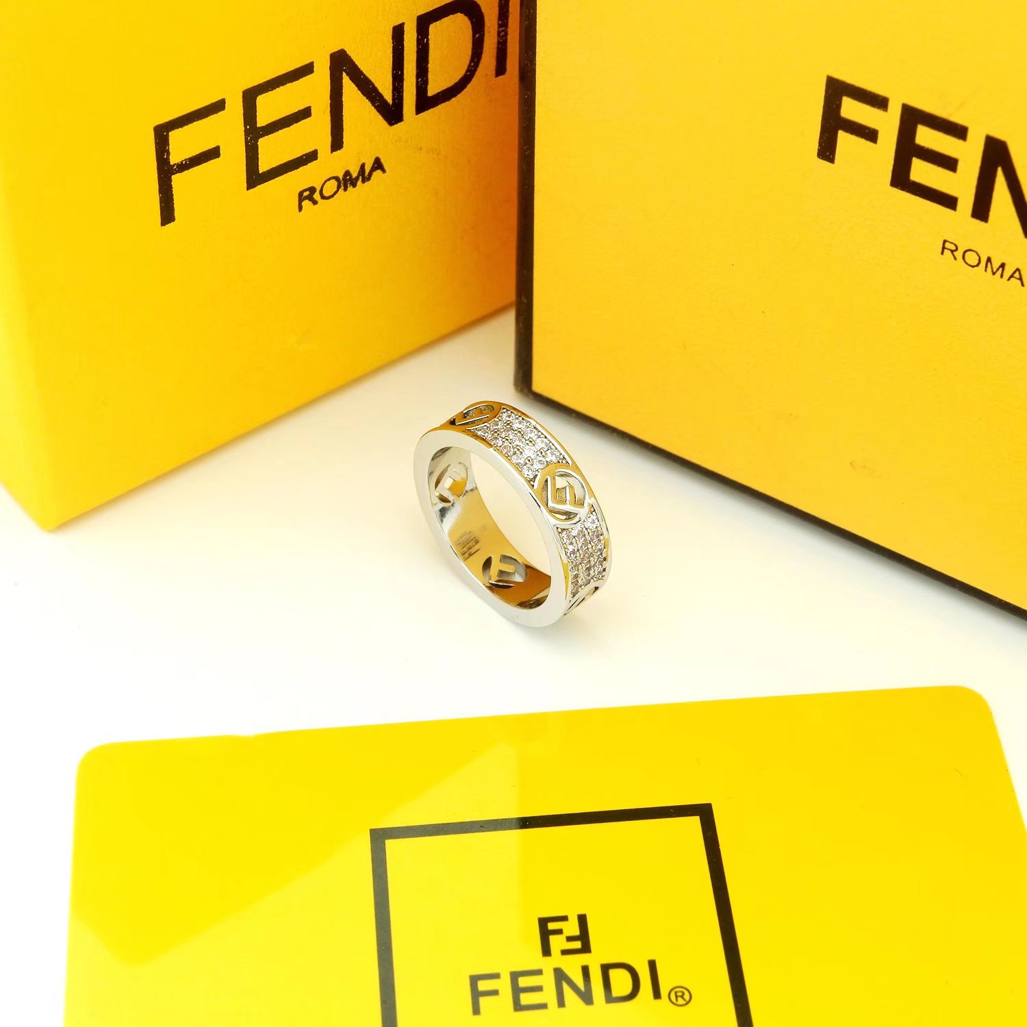 Fendi F IS FENDI ring Gold-tone metal with clear crystals rose gold-tone metal with clear crystals silver-tone metal with clear crystals 6 7 8 9