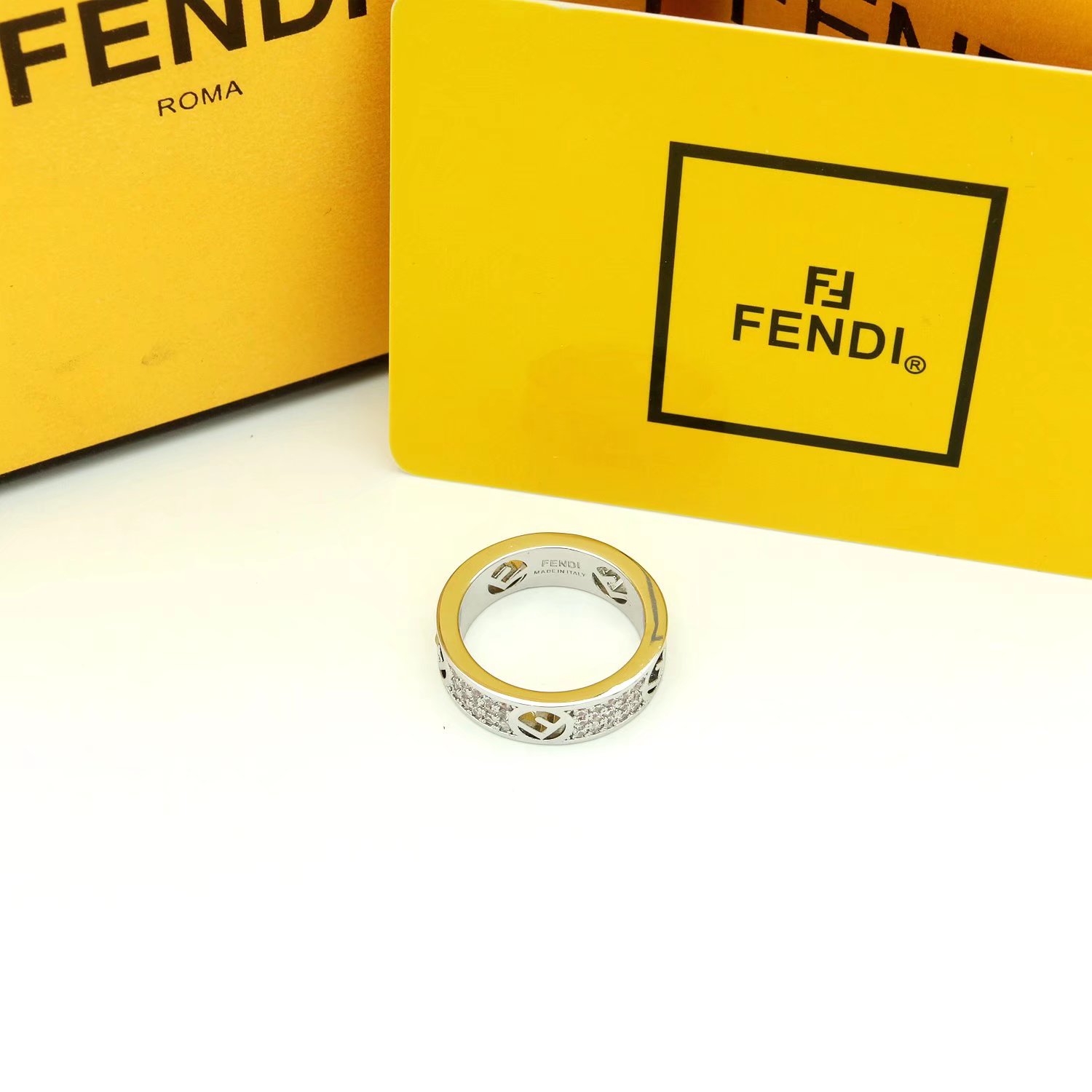 Fendi F IS FENDI ring Gold-tone metal with clear crystals rose gold-tone metal with clear crystals silver-tone metal with clear crystals 6 7 8 9