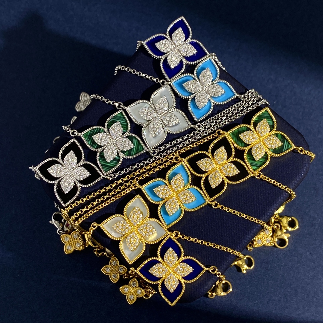 Roberto Coin Princess Flower bracelet Silver-toned white gold with blue enamel and pave white diamonds Yellow gold with green malachite and pave white diamonds Silver-toned white gold with black onyx and pave white diamonds Silver-toned white gold with light blue enamel and pave white diamonds Silver-toned white gold with white mother-of-pearl and pave white diamonds 17cm