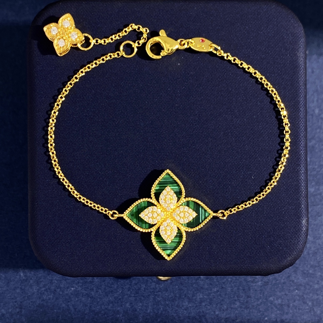 Roberto Coin Princess Flower bracelet Silver-toned white gold with blue enamel and pave white diamonds Yellow gold with green malachite and pave white diamonds Silver-toned white gold with black onyx and pave white diamonds Silver-toned white gold with light blue enamel and pave white diamonds Silver-toned white gold with white mother-of-pearl and pave white diamonds 17cm