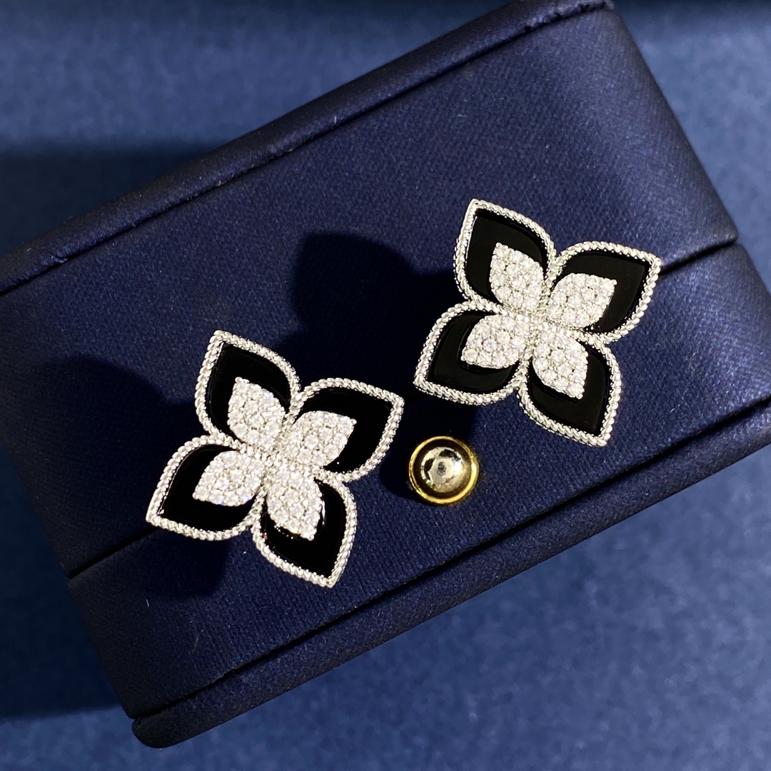 Roberto Coin Princess Flower earrings Available in rose gold yellow gold and white gold metal options with center pave diamonds and inlay options of white mother-of-pearl blue lapis lazuli turquoise green malachite and black onyx 15mm stud diameter