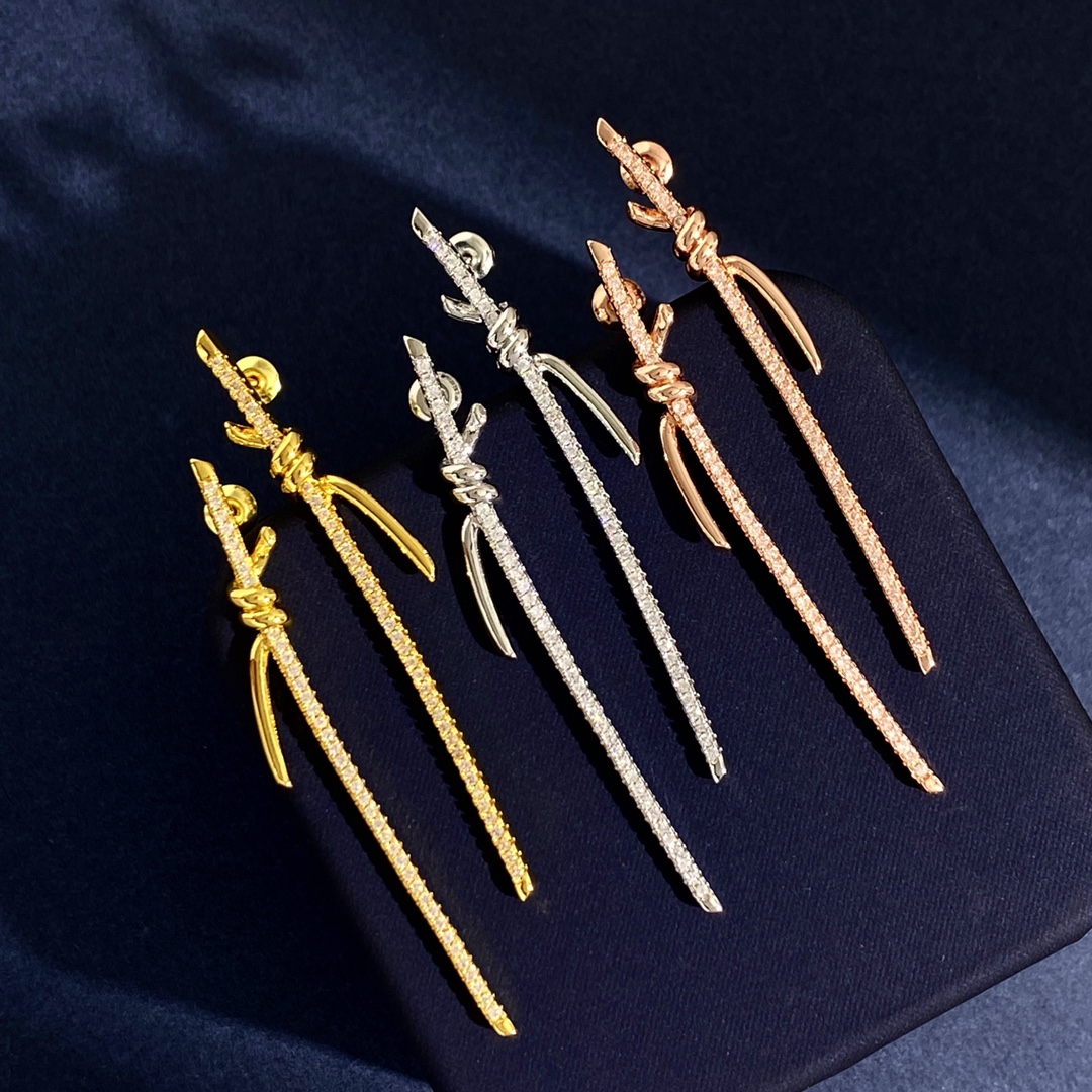 Tiffany Knot earrings available in yellow gold silver rose gold with clear diamond pave 6 5cm length