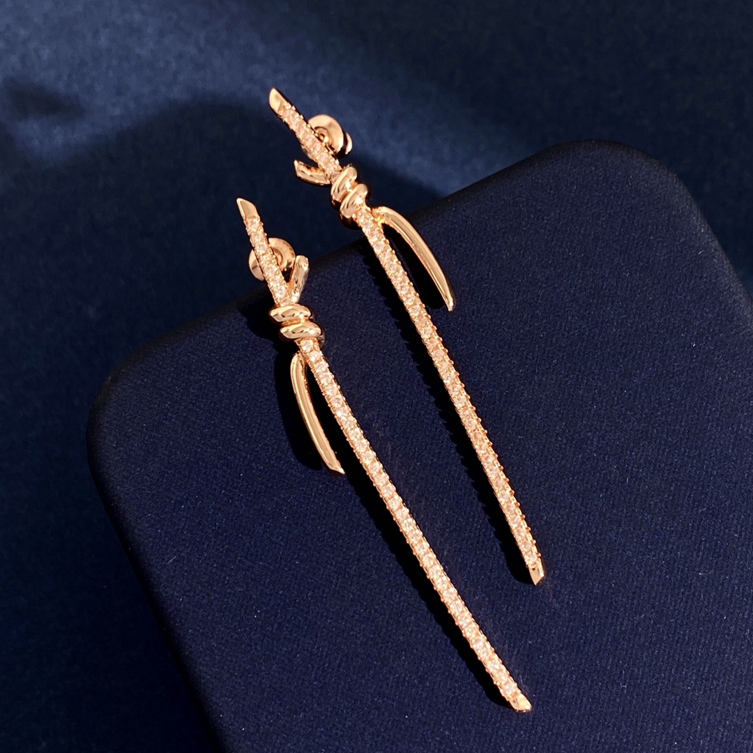 Tiffany Knot earrings available in yellow gold silver rose gold with clear diamond pave 6 5cm length