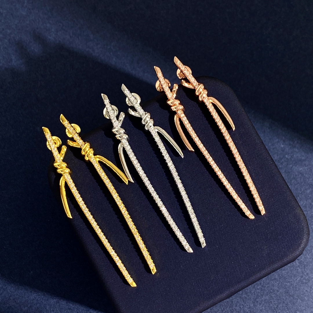 Tiffany Knot earrings available in yellow gold silver rose gold with clear diamond pave 6 5cm length