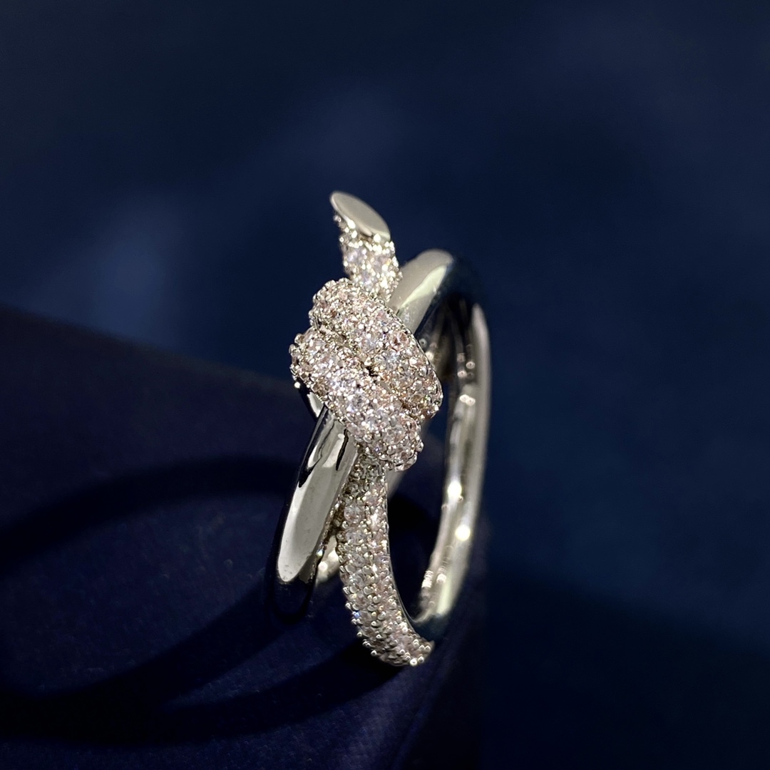 Tiffany Knot ring Yellow gold with clear diamond pave accents US 7