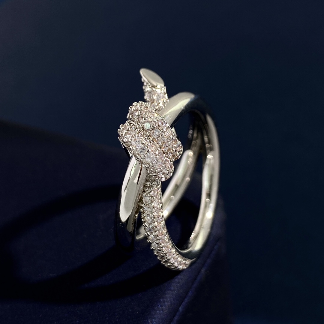 Tiffany Knot ring Yellow gold with clear diamond pave accents US 7