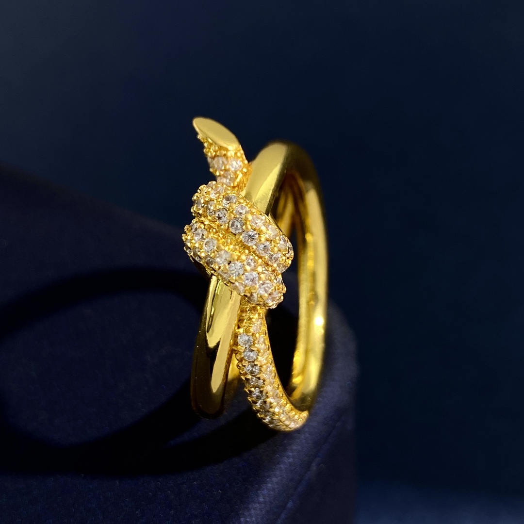 Tiffany Knot ring Yellow gold with clear diamond pave accents US 7
