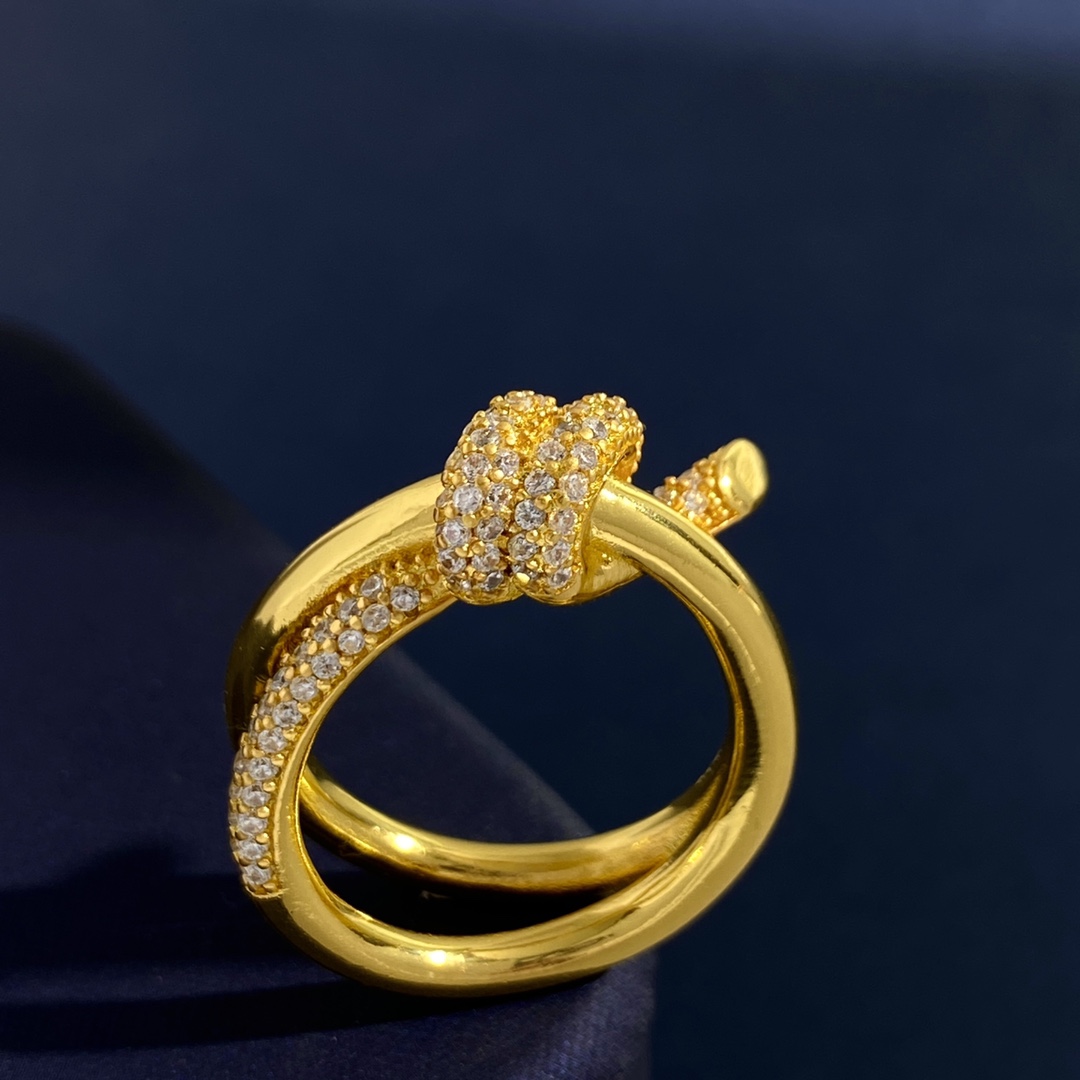 Tiffany Knot ring Yellow gold with clear diamond pave accents US 7