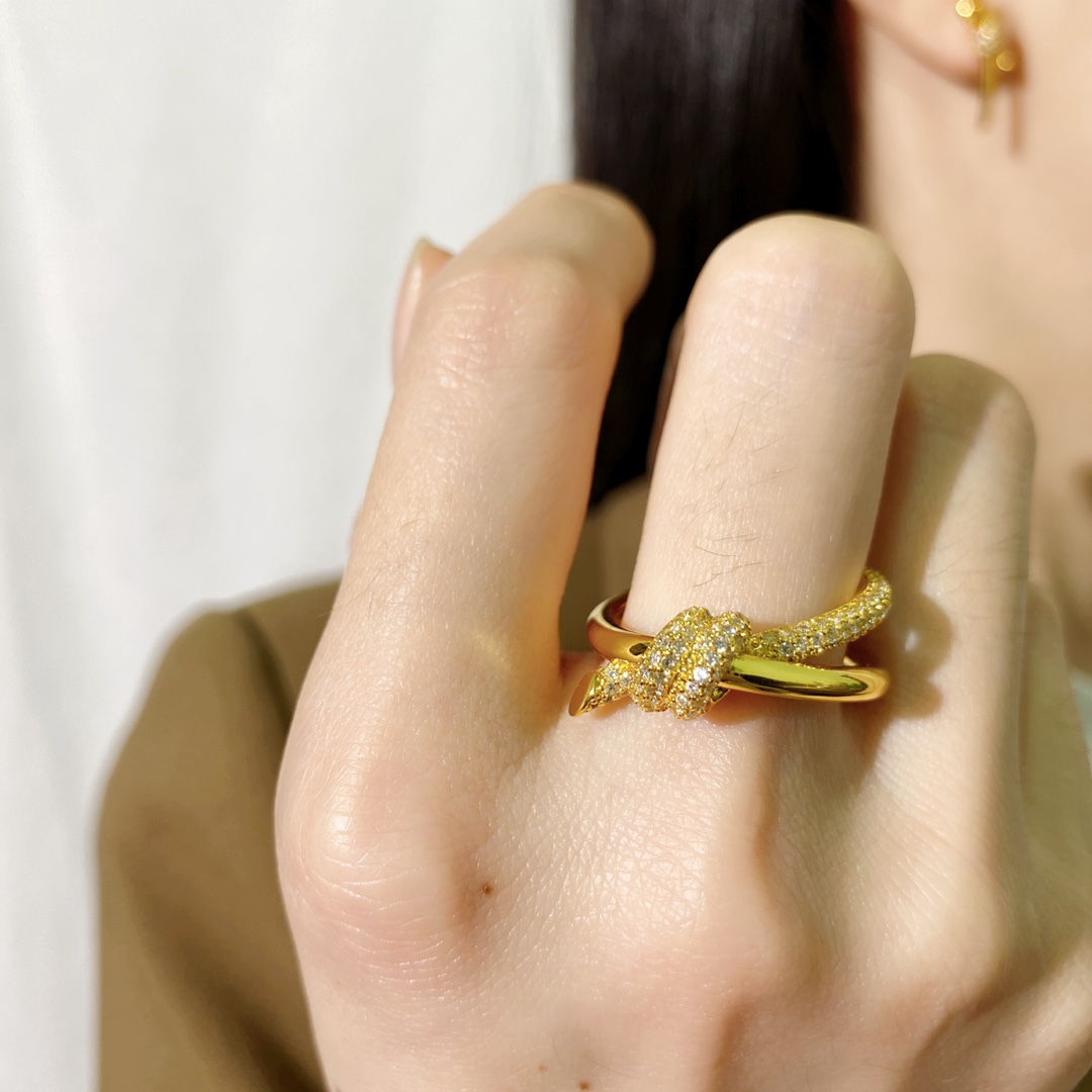 Tiffany Knot ring Yellow gold with clear pave diamonds silver-toned white gold with clear pave diamonds US 7