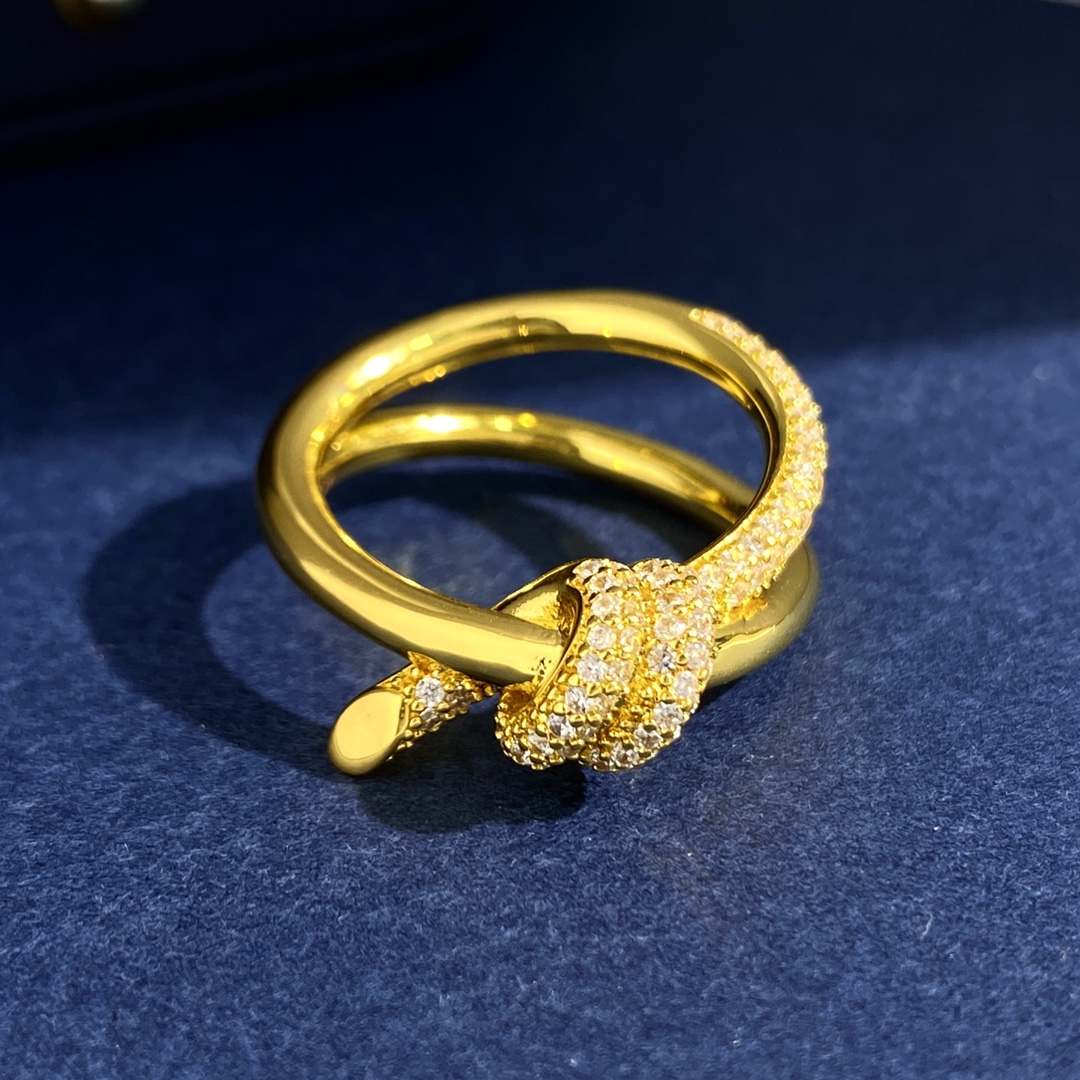 Tiffany Knot ring Yellow gold with clear pave diamonds silver-toned white gold with clear pave diamonds US 7