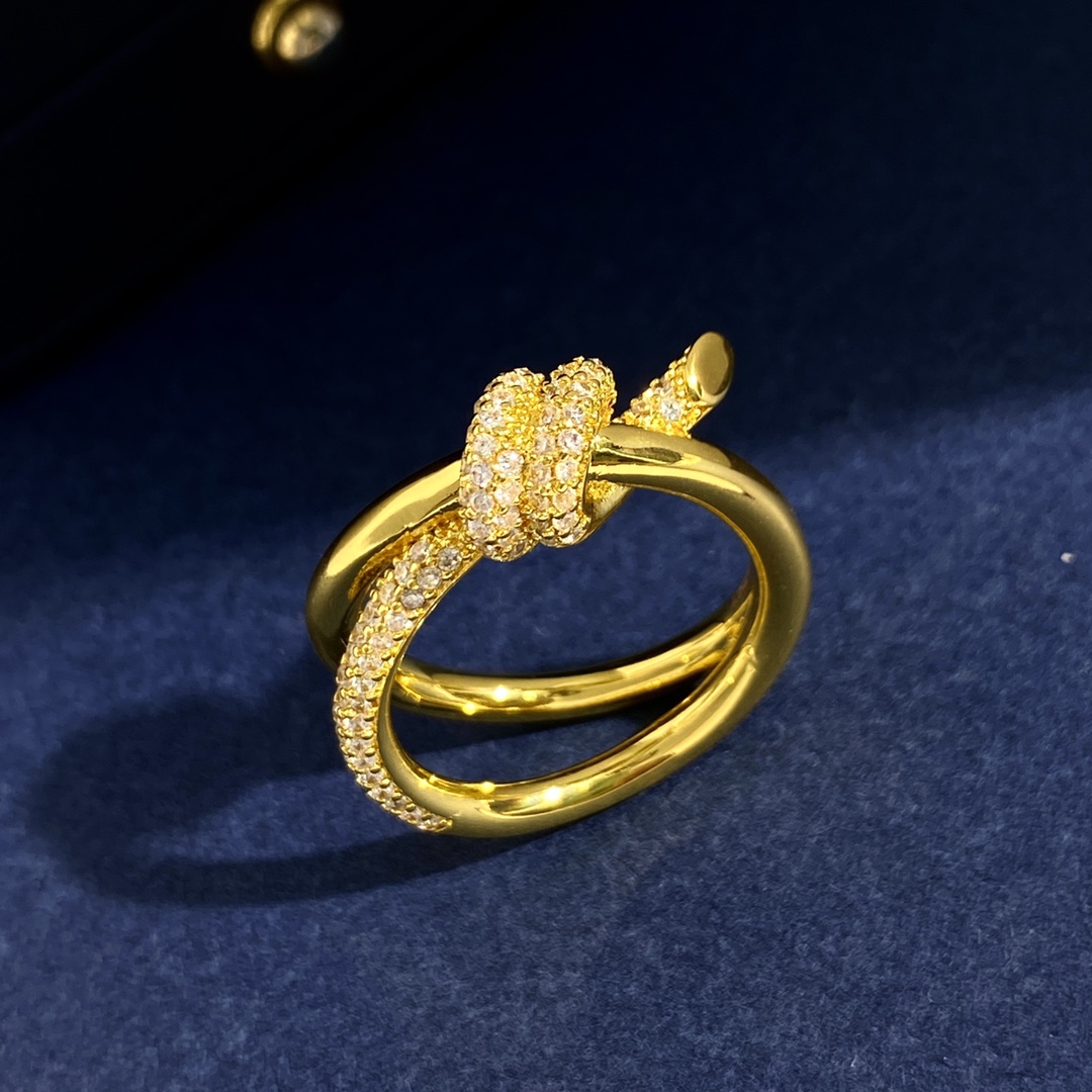 Tiffany Knot ring Yellow gold with clear pave diamonds silver-toned white gold with clear pave diamonds US 7