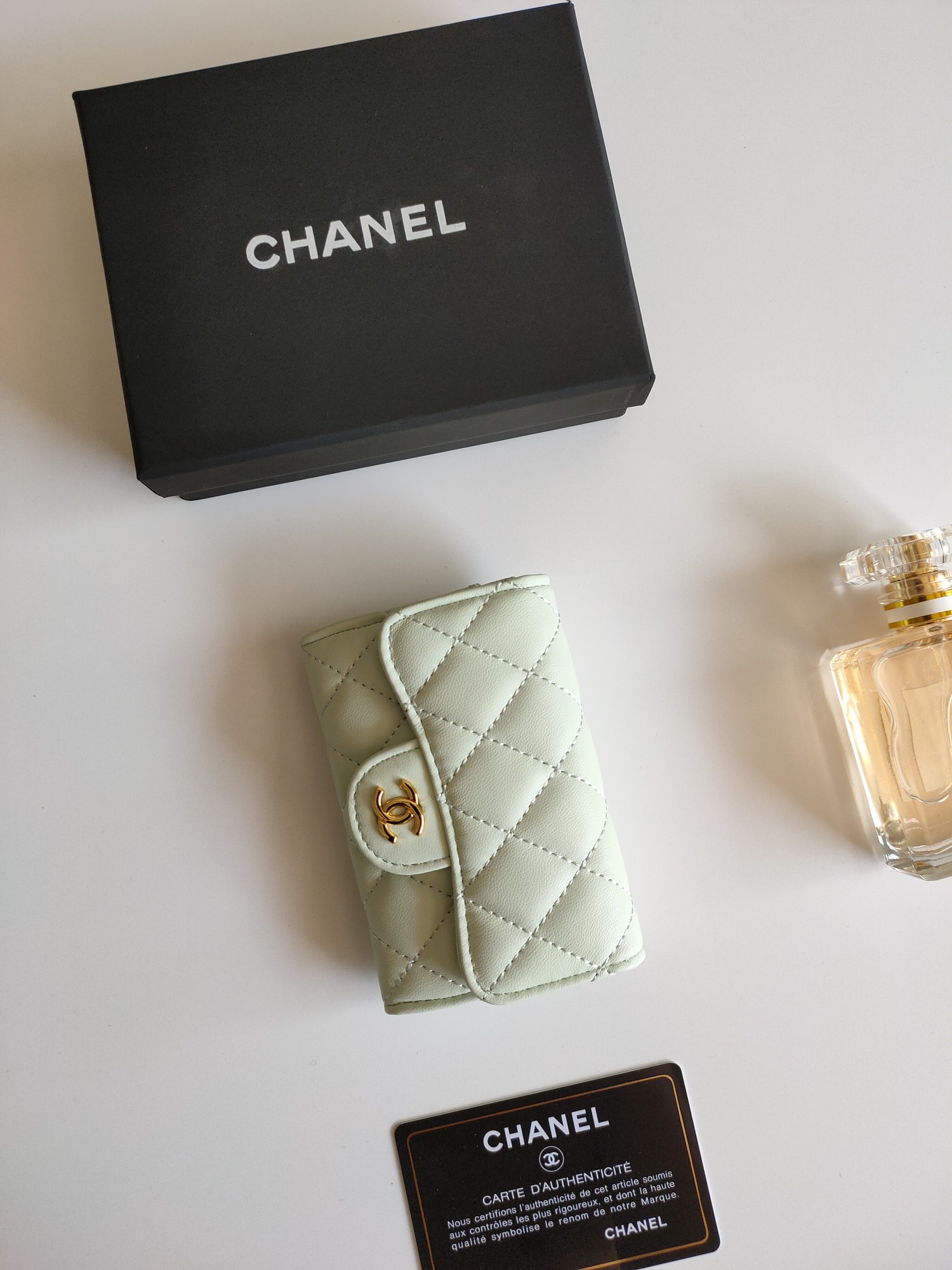 Chanel Classic Flap Card Holder card holder Light mint green lambskin leather with gold-tone metal hardware burgundy interior lining 7 5 11 3 2 1 cm