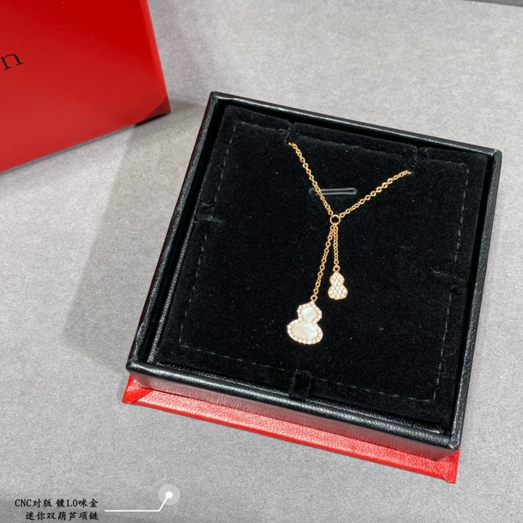 Qeelin Kirin Mini Double Gourd necklace Gold plated metal with clear high carbon diamond accents available with green enamel white mother-of-pearl or red enamel inlay 42cm with 3cm extender