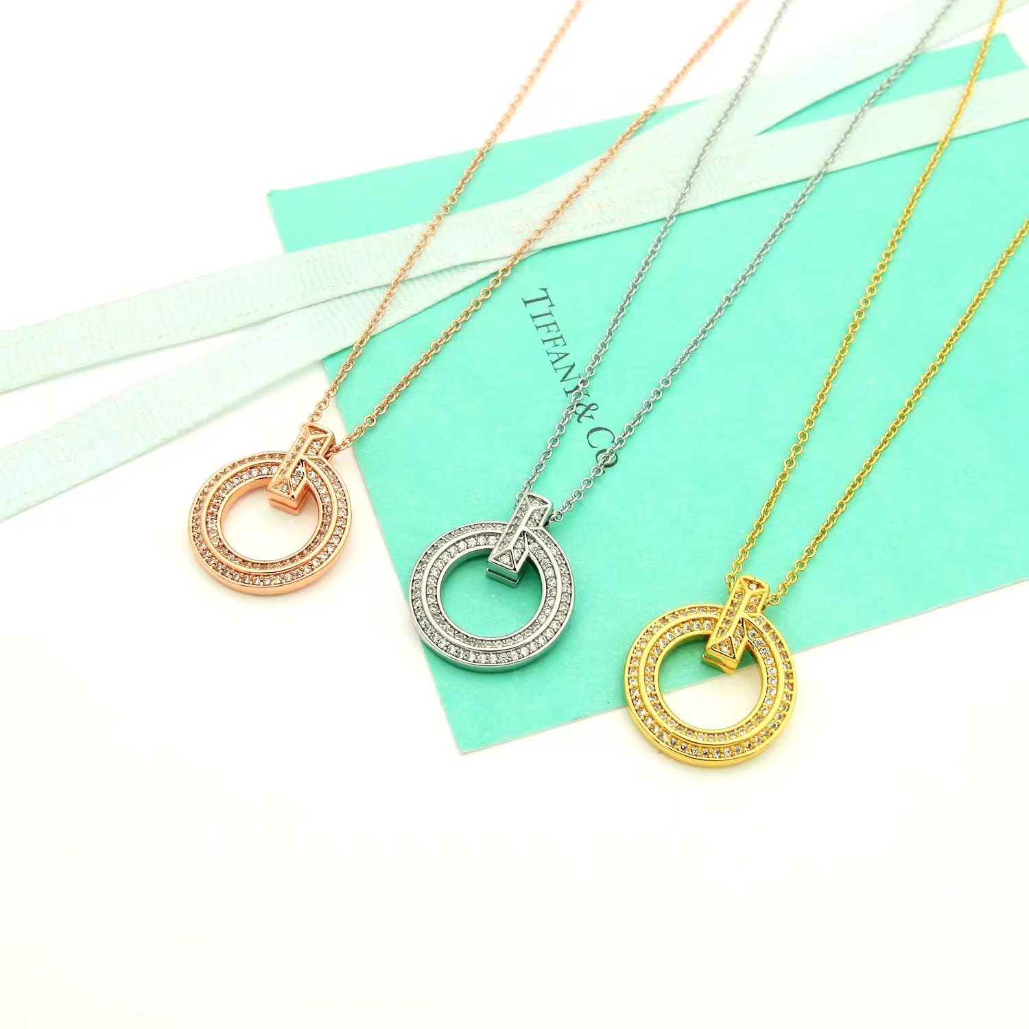 Tiffany Co T1 necklace silver-toned metal with clear diamond accents 18 inches