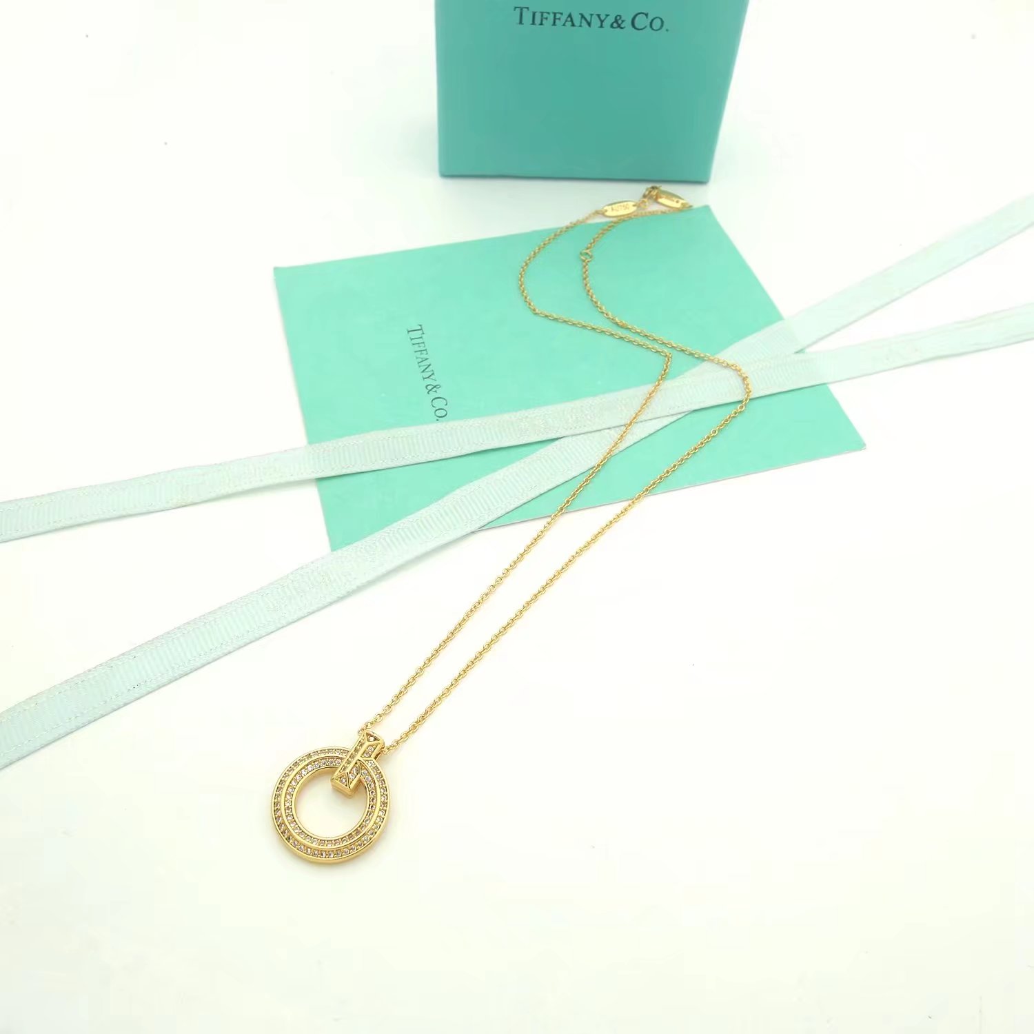Tiffany Co T1 necklace silver-toned metal with clear diamond accents 18 inches