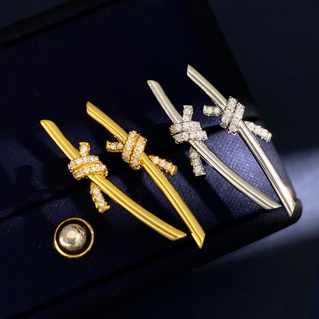 Tiffany Tiffany Knot earrings Yellow gold with clear diamond accents 4 5cm drop length