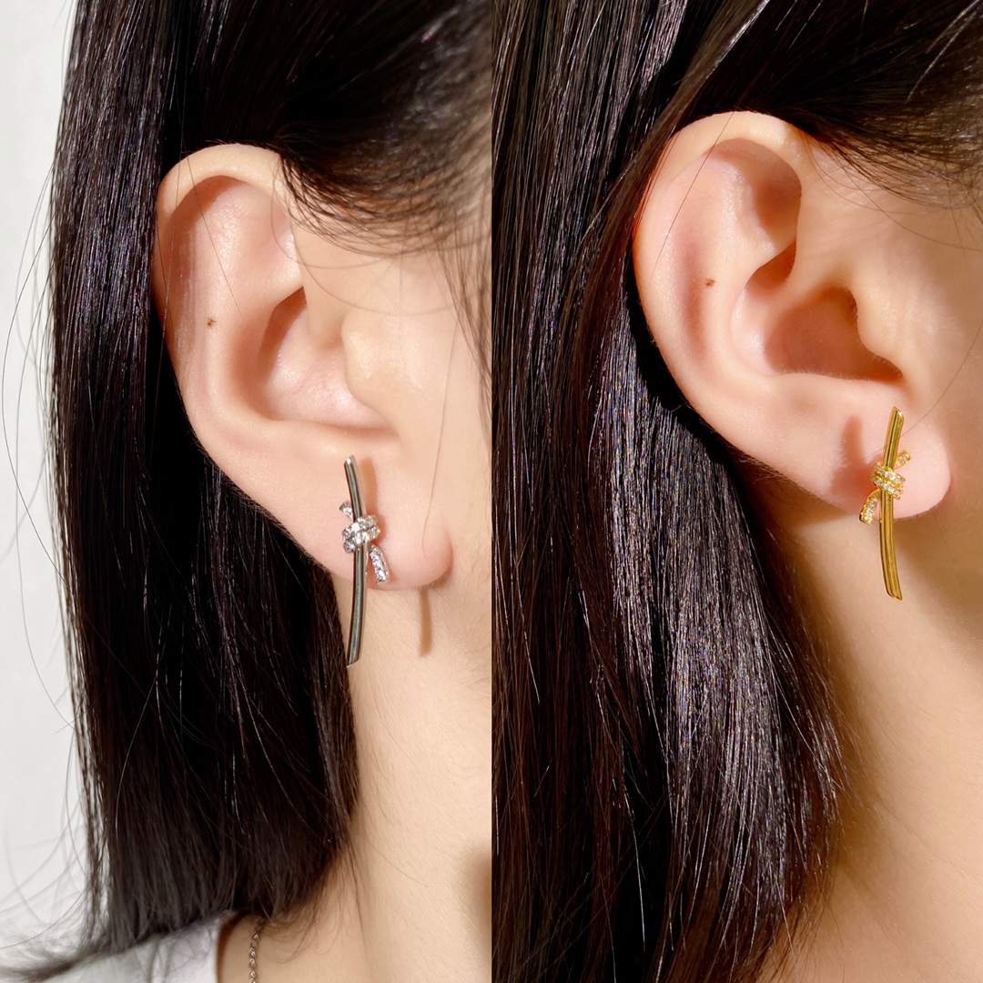 Tiffany Tiffany Knot earrings Yellow gold with clear diamond accents 4 5cm drop length