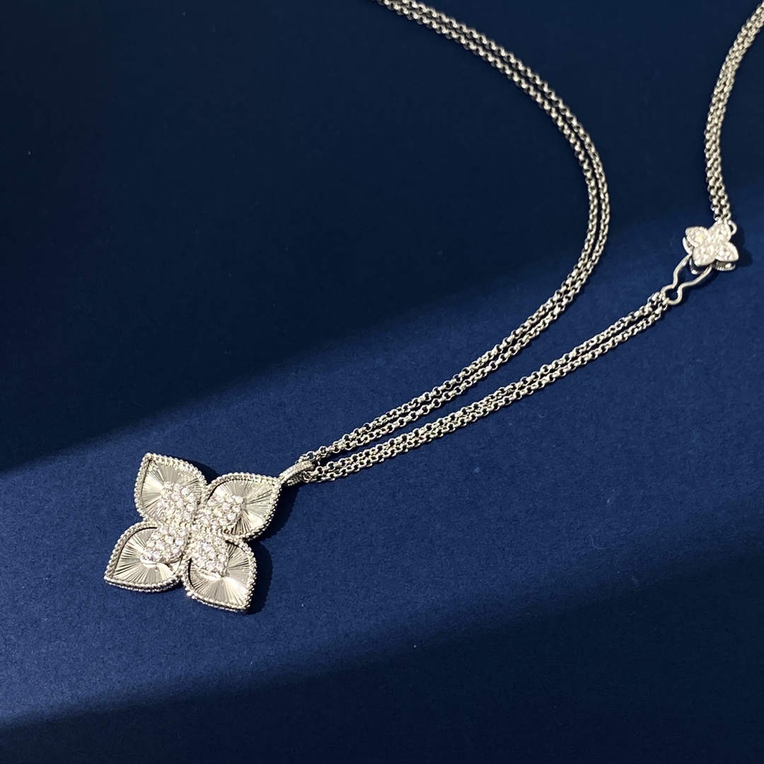 Collana Roberto Coin Princess Flower in oro giallo 18 carati con pavé di diamanti Oro bianco 18 carati con pavé di diamanti Catena regolabile da 18 pollici
