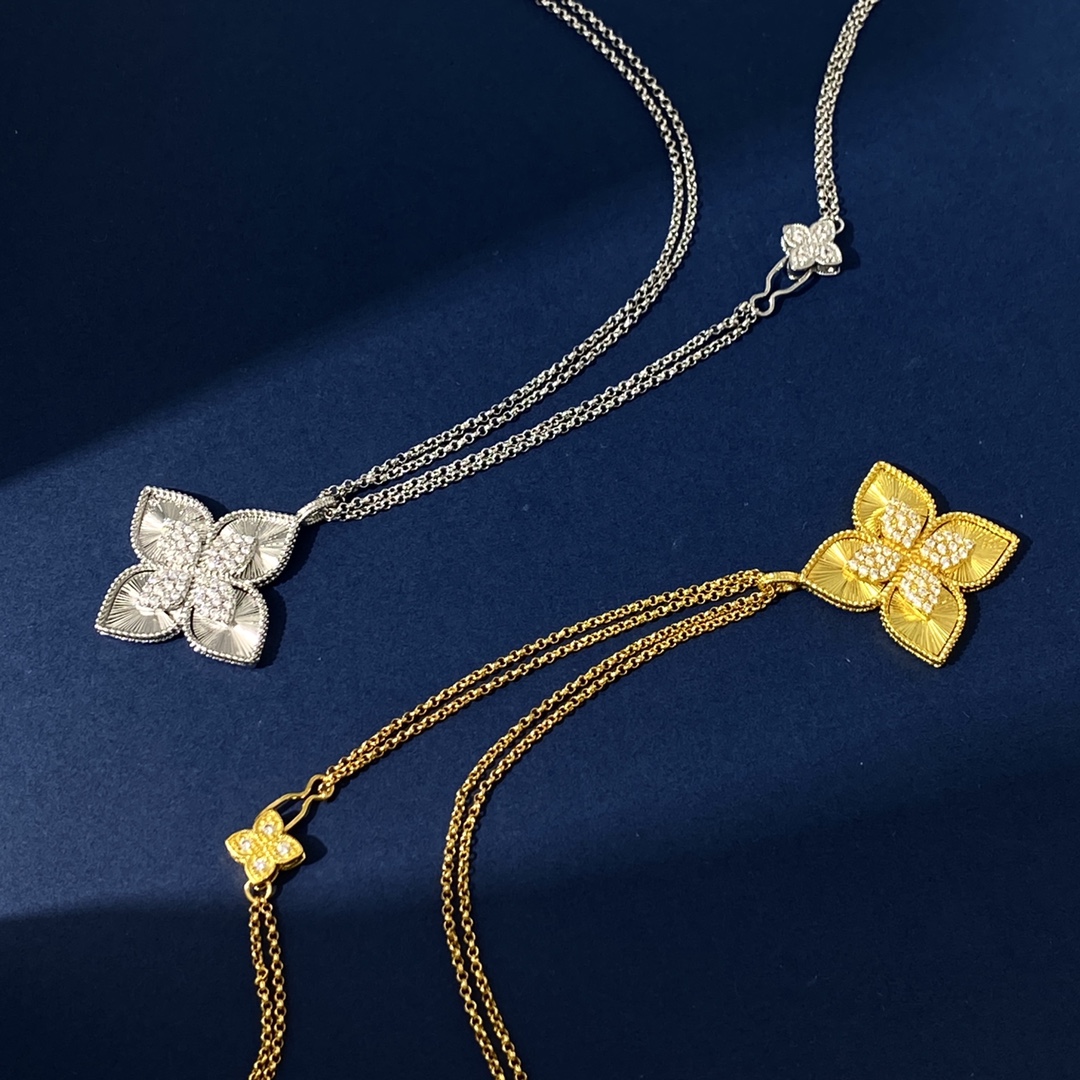 Collana Roberto Coin Princess Flower in oro giallo 18 carati con pavé di diamanti Oro bianco 18 carati con pavé di diamanti Catena regolabile da 18 pollici