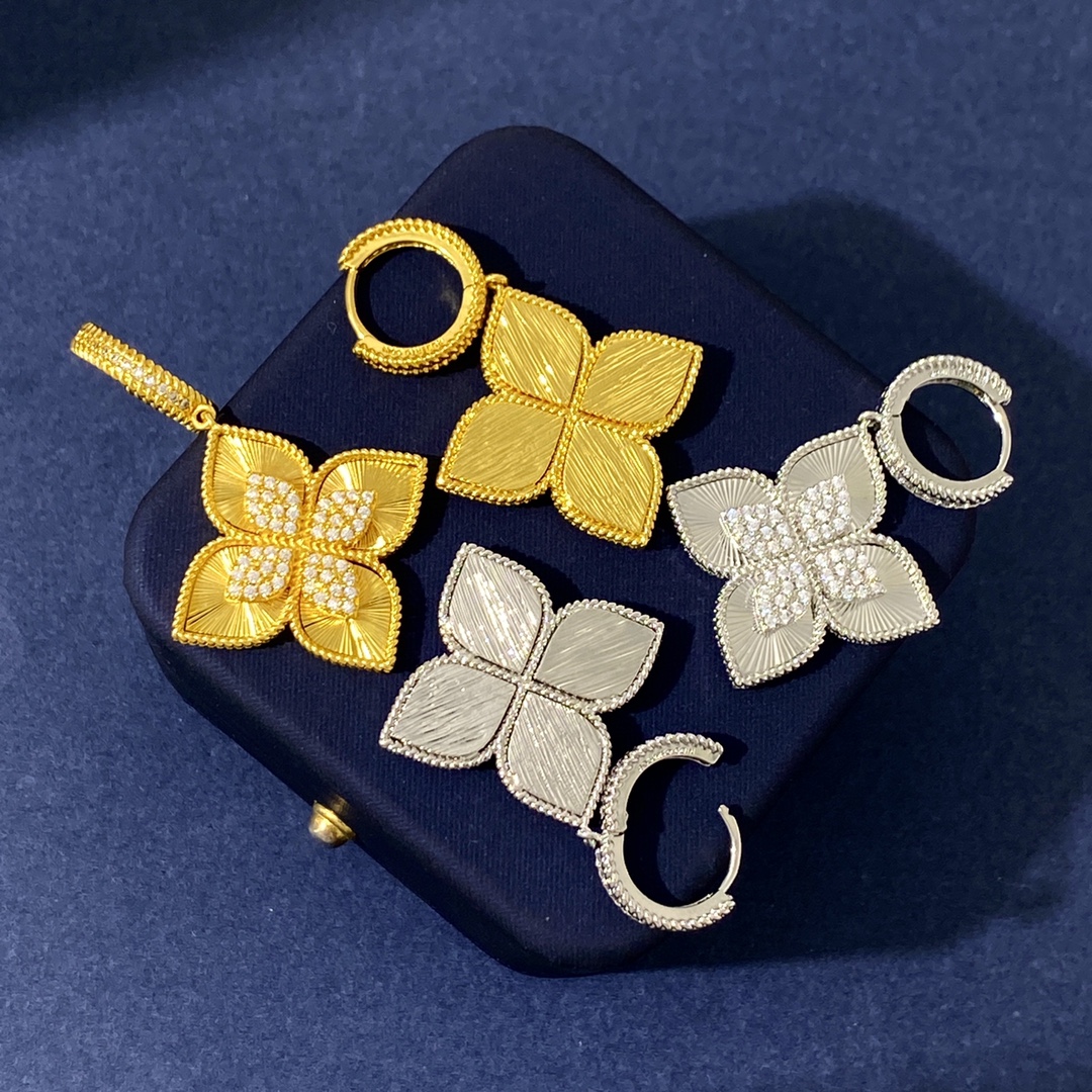 Van Cleef Arpels Vintage Alhambra earrings 18K yellow gold with clear diamond accents 18K white gold with clear diamond accents One Size