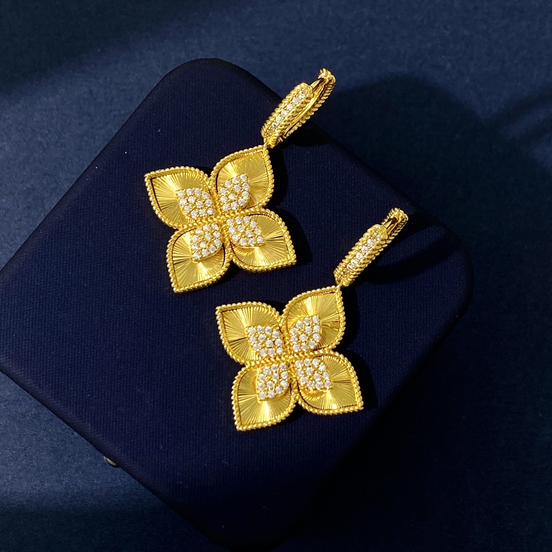 Van Cleef Arpels Vintage Alhambra earrings 18K yellow gold with clear diamond accents 18K white gold with clear diamond accents One Size