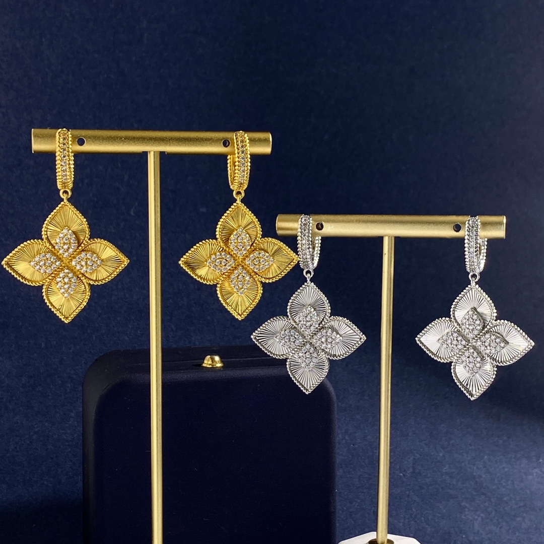 Van Cleef Arpels Vintage Alhambra earrings 18K yellow gold with clear diamond accents 18K white gold with clear diamond accents One Size