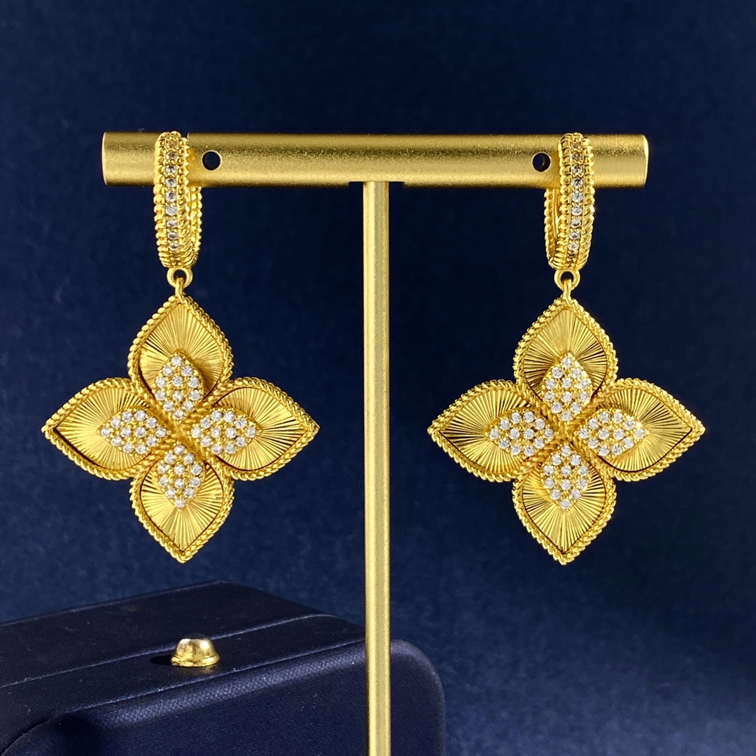 Van Cleef Arpels Vintage Alhambra earrings 18K yellow gold with clear diamond accents 18K white gold with clear diamond accents One Size