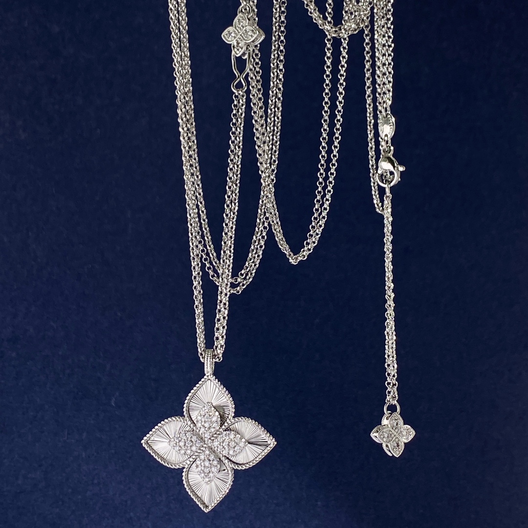 Collana Roberto Coin Princess Flower in oro giallo 18 carati con pavé di diamanti Oro bianco 18 carati con pavé di diamanti Catena regolabile da 18 pollici