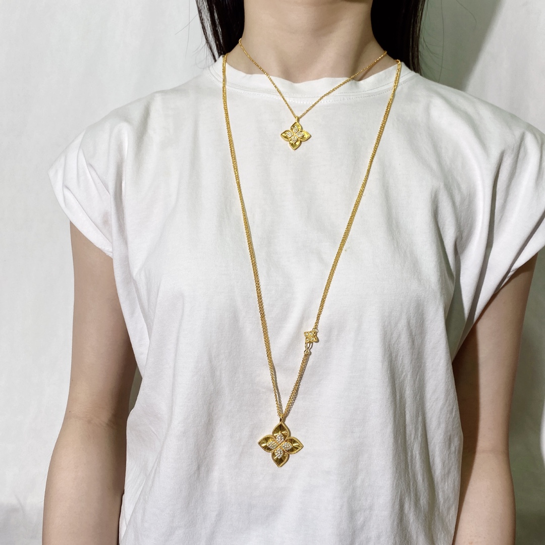 Collana Roberto Coin Princess Flower in oro giallo 18 carati con pavé di diamanti Oro bianco 18 carati con pavé di diamanti Catena regolabile da 18 pollici