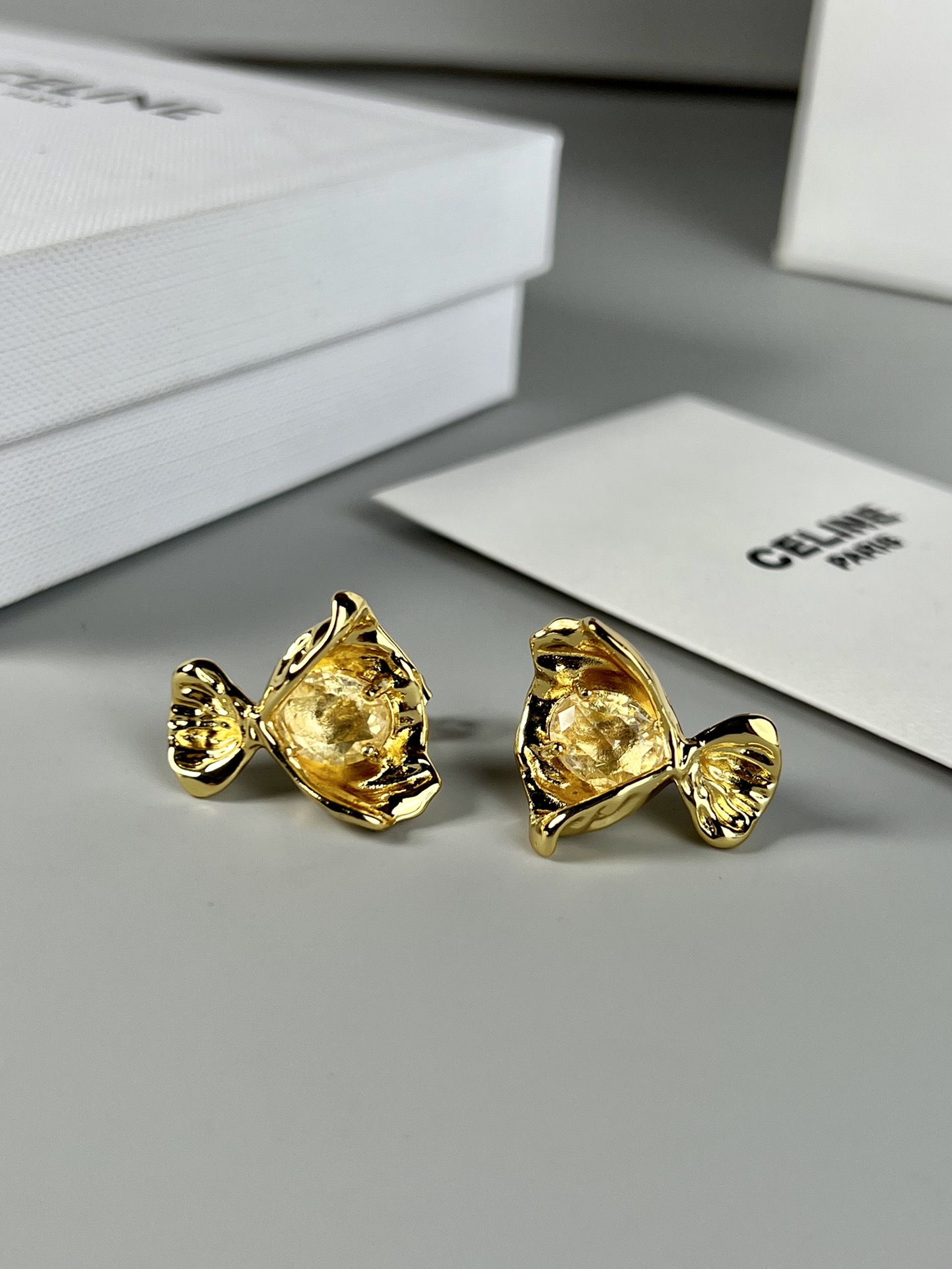 Celine Fish Stud Earrings earrings Gold-toned metal with clear red and green faceted gemstones 1 5cm stud diameter
