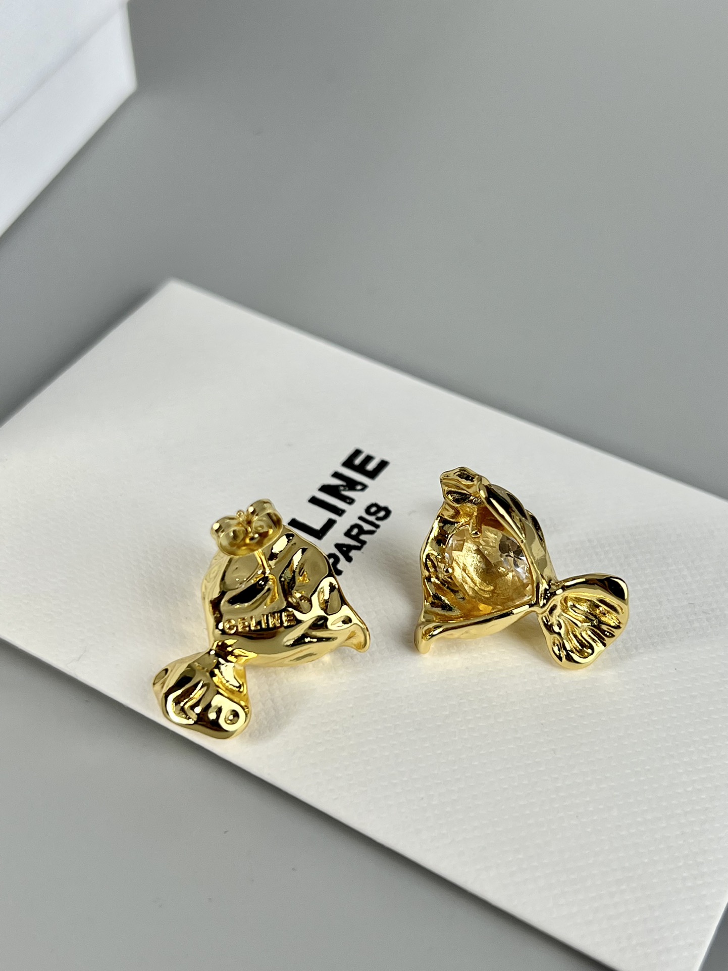 Celine Fish Stud Earrings earrings Gold-toned metal with clear red and green faceted gemstones 1 5cm stud diameter