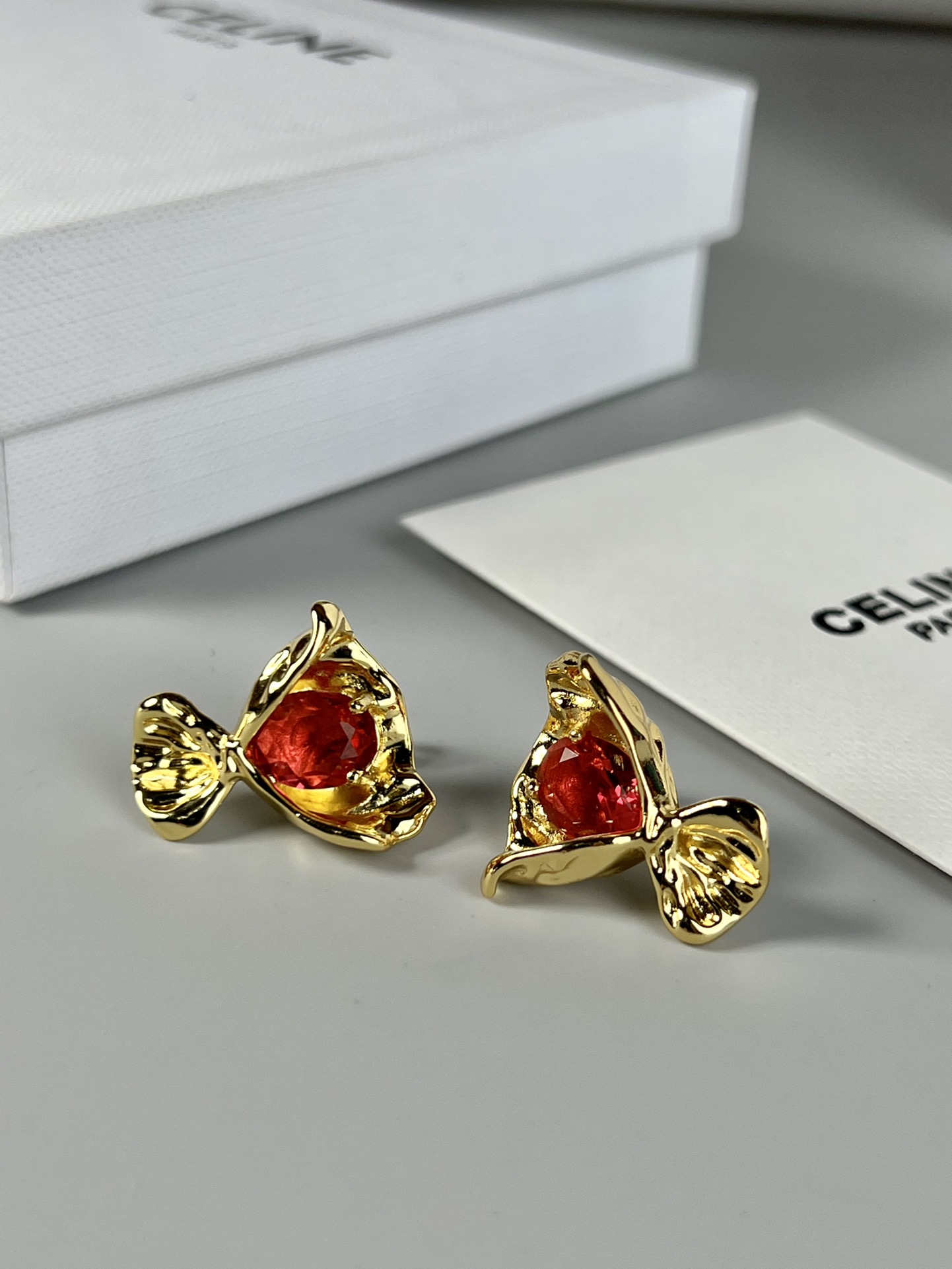 Celine Fish Stud Earrings earrings Gold-toned metal with clear red and green faceted gemstones 1 5cm stud diameter