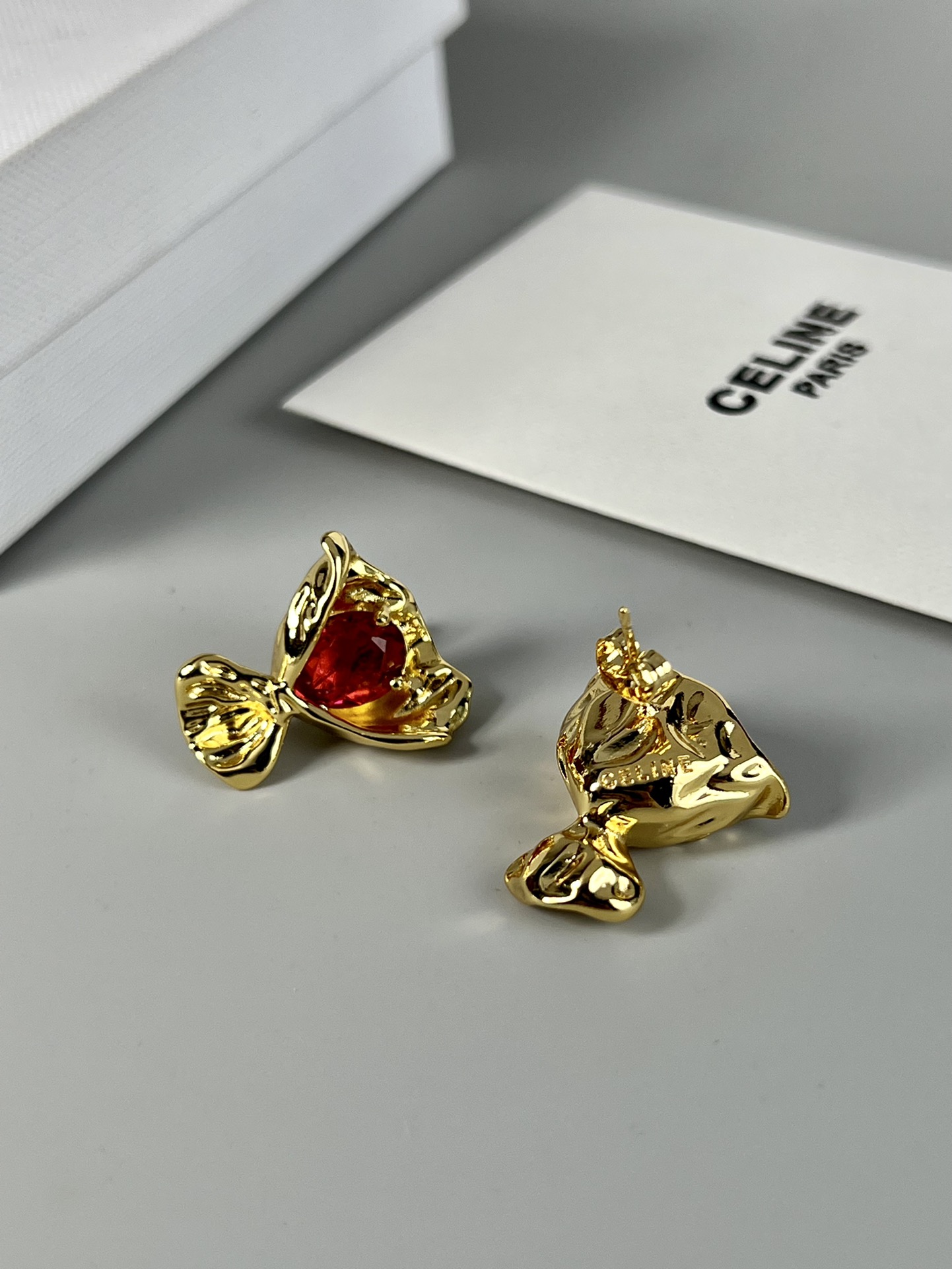Celine Fish Stud Earrings earrings Gold-toned metal with clear red and green faceted gemstones 1 5cm stud diameter