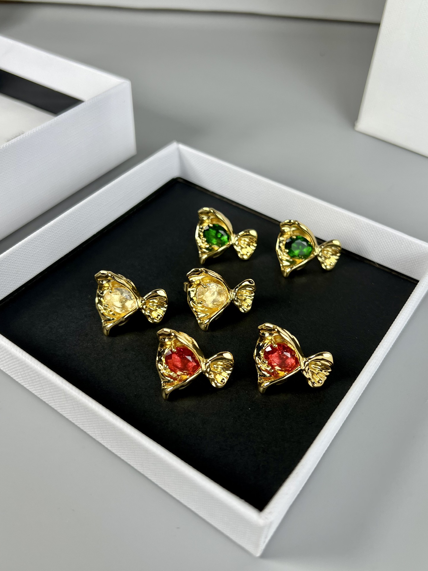 Celine Fish Stud Earrings earrings Gold-toned metal with clear red and green faceted gemstones 1 5cm stud diameter