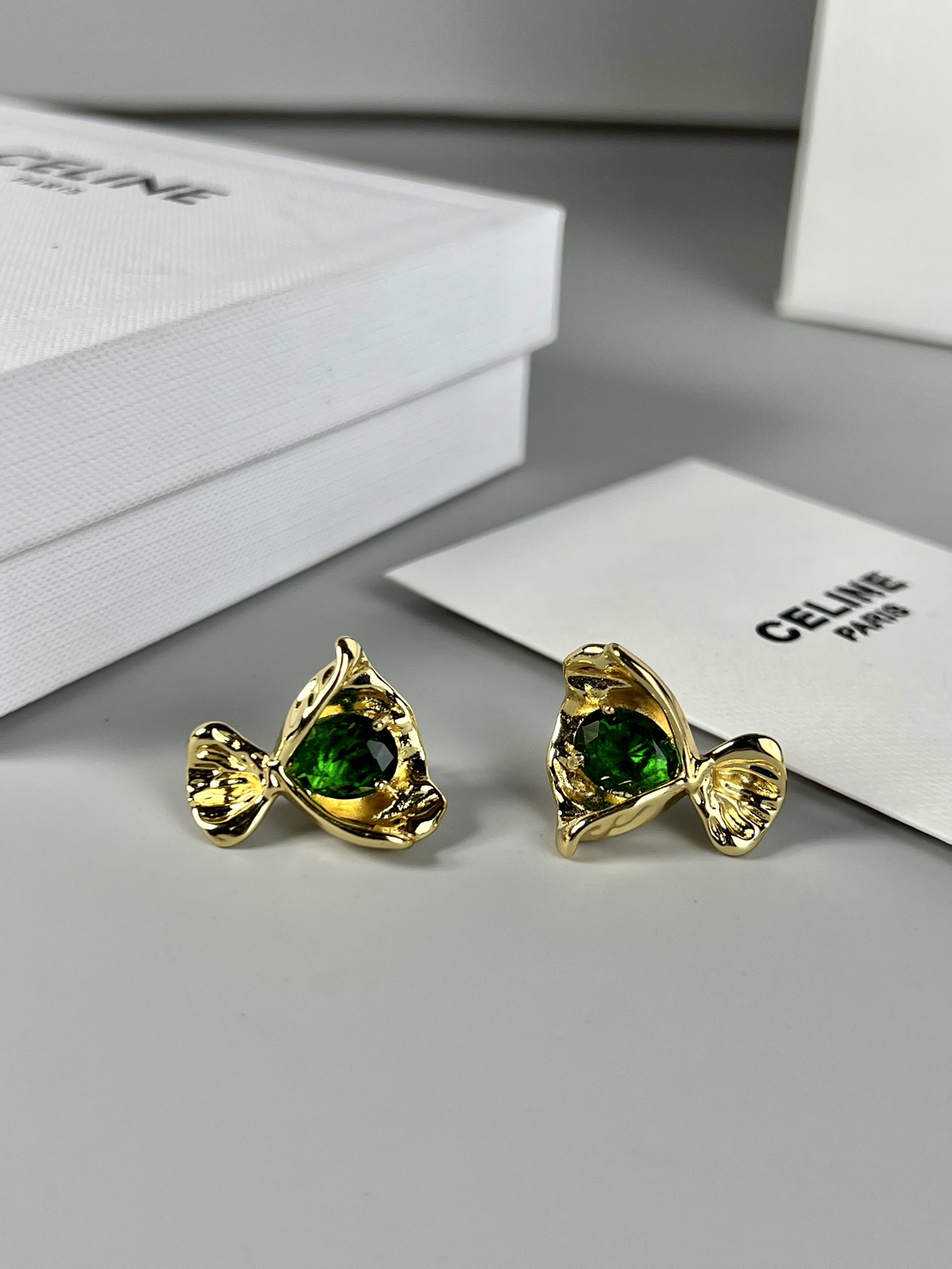 Celine Fish Stud Earrings earrings Gold-toned metal with clear red and green faceted gemstones 1 5cm stud diameter