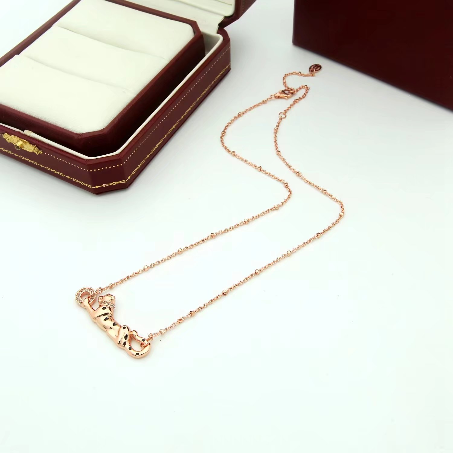 Cartier Panthere de Cartier necklace Silver-toned metal with black enamel spots and clear diamond accents 42cm