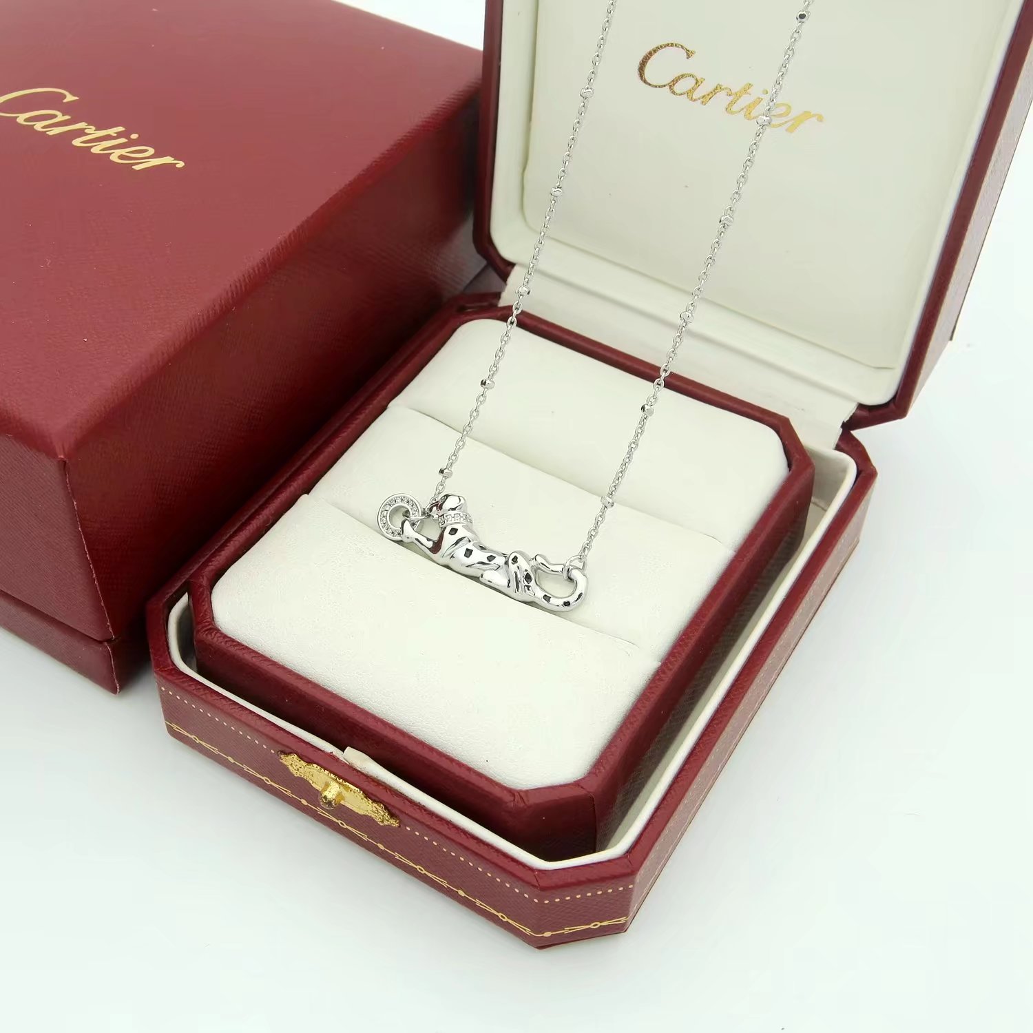 Cartier Panthere de Cartier necklace Silver-toned metal with black enamel spots and clear diamond accents 42cm