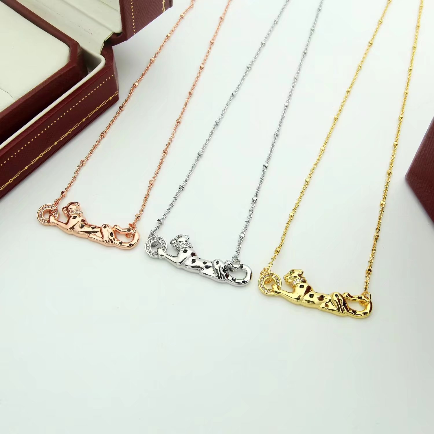 Cartier Panthere de Cartier necklace 18K yellow gold black lacquer spots tsavorite garnet diamond 42cm