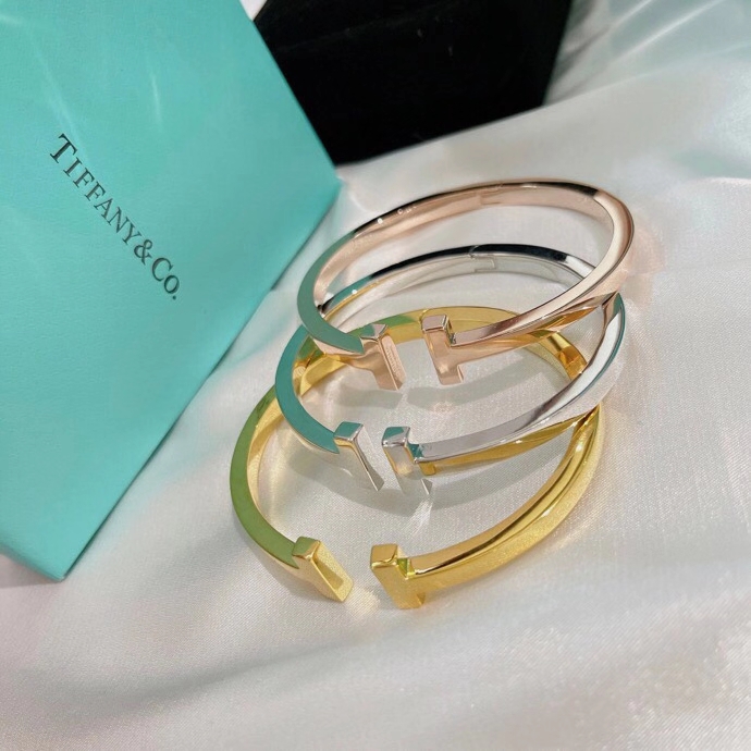 Tiffany Co Tiffany T bracelet 18k yellow gold 18k rose gold sterling silver no gemstones 17cm inner circumference